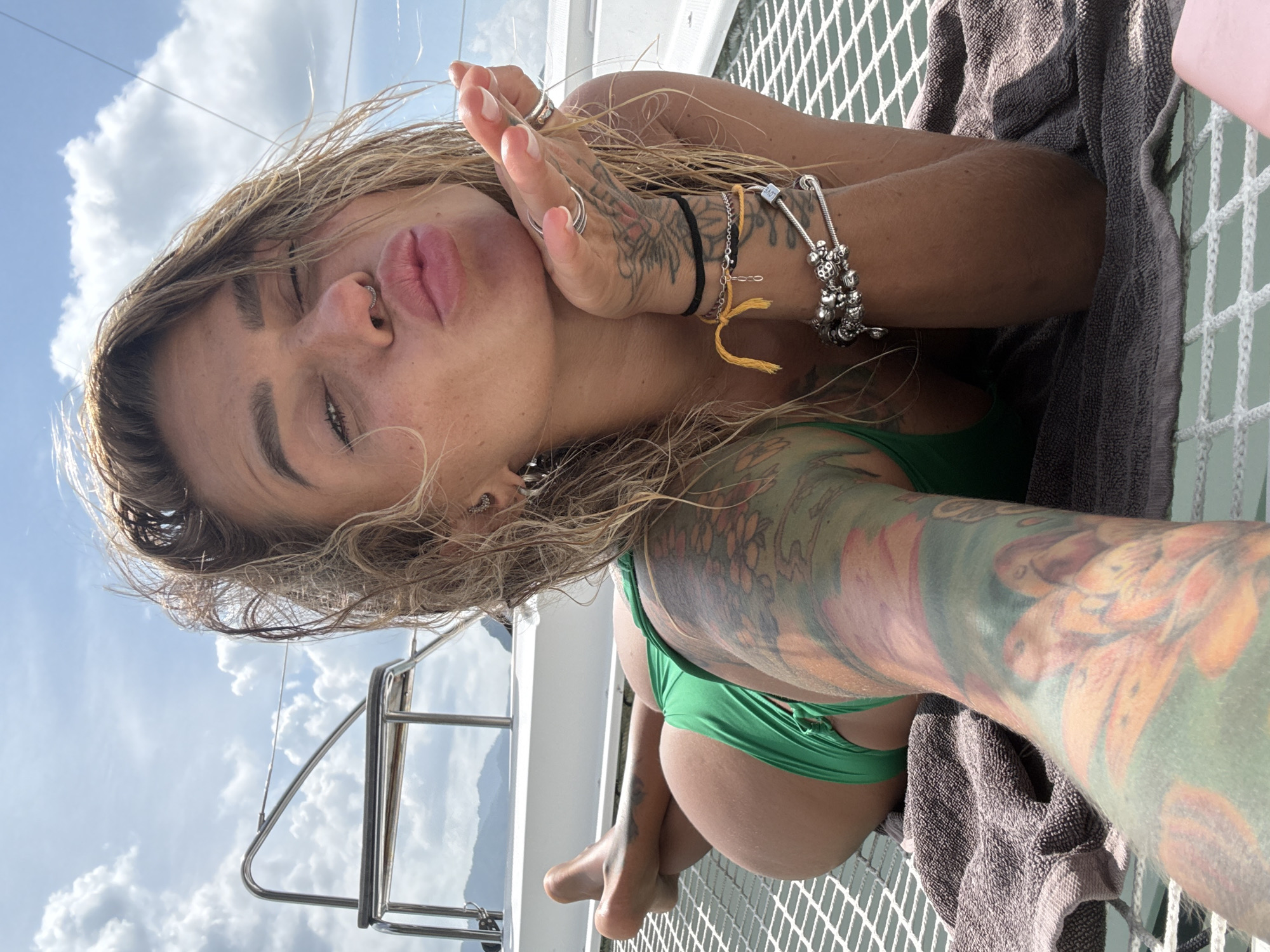 Relaxing on boat netting off the coast of southern Thailand