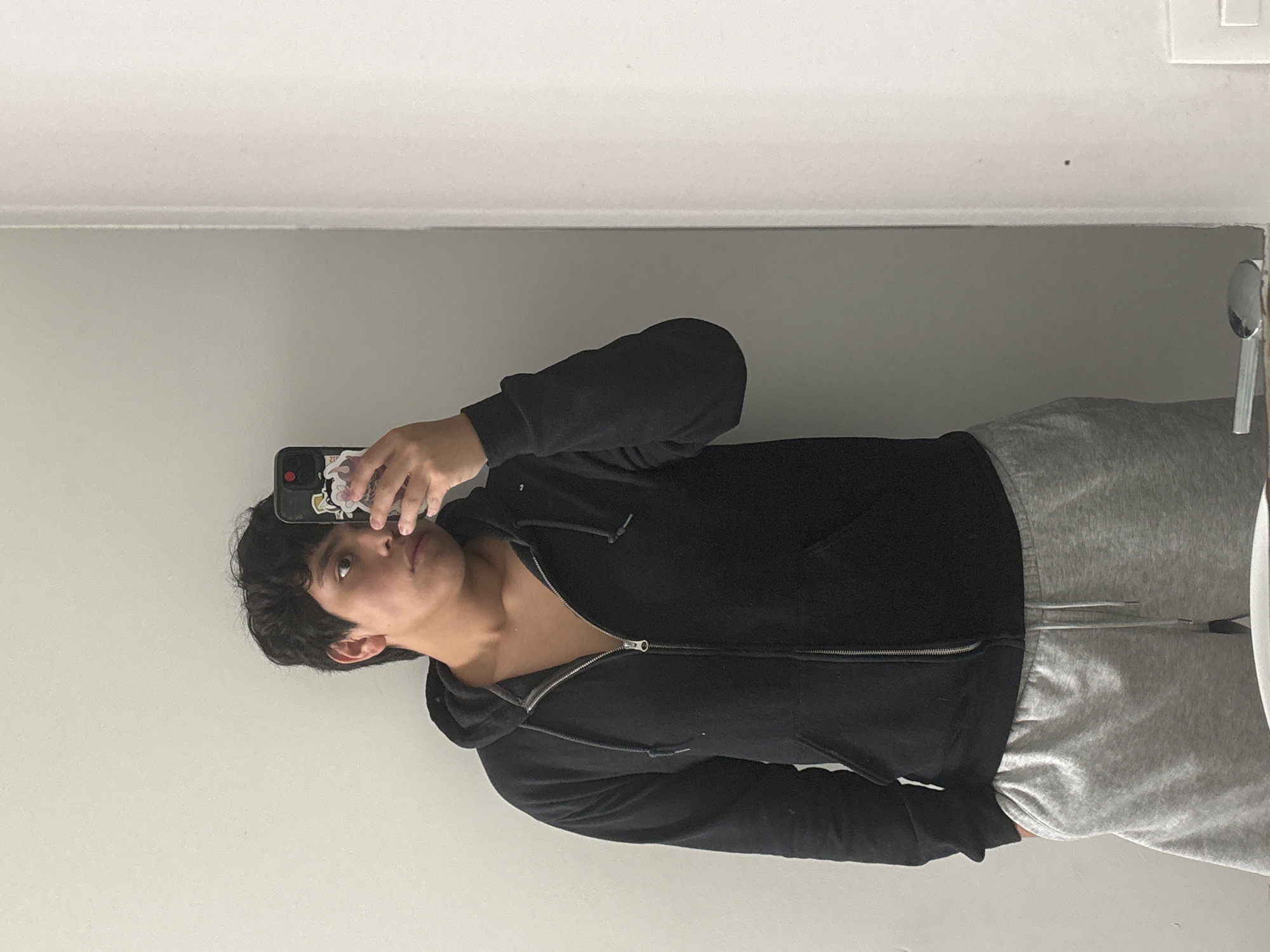Young person takes bathroom selfie in Mexico City