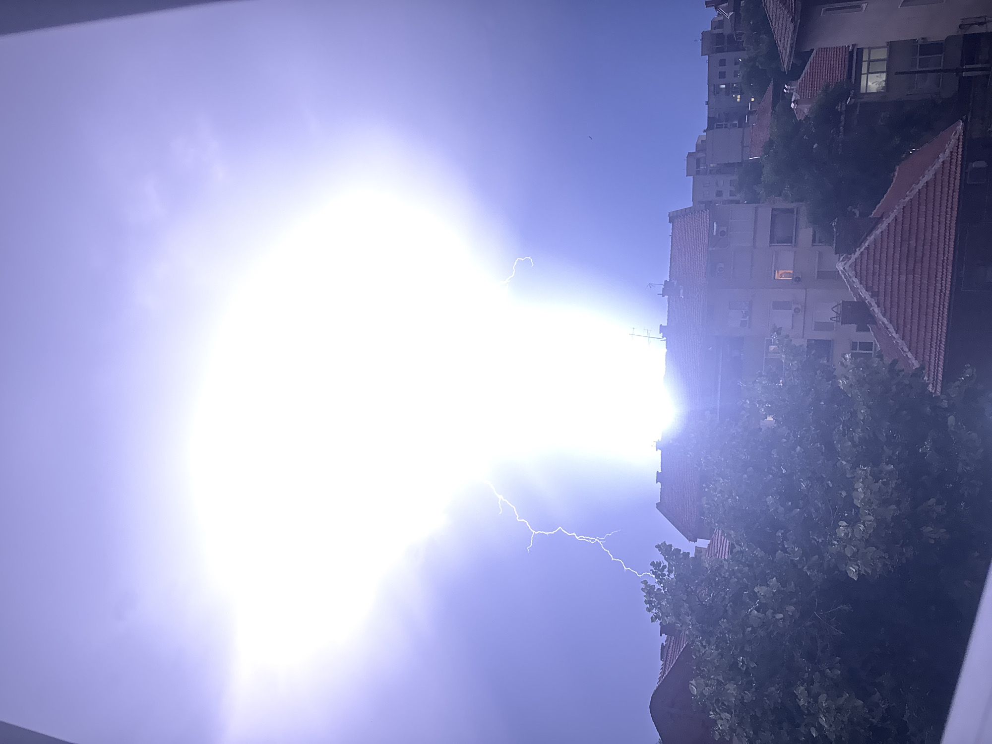 Lightning storm illuminates Plovdiv, Bulgaria evening sky