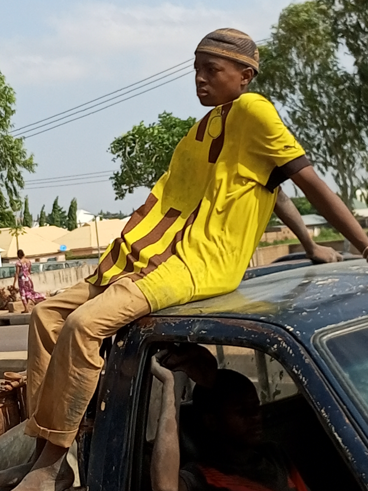 Everyday street life across two Nigerian towns, July morning