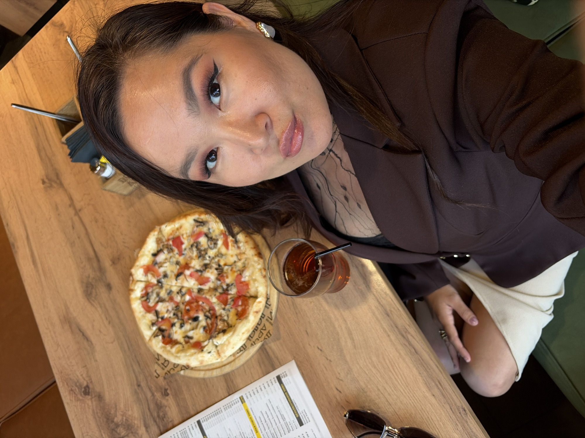 Woman dines at Uncle Archie Beer Bistro in Izhevsk