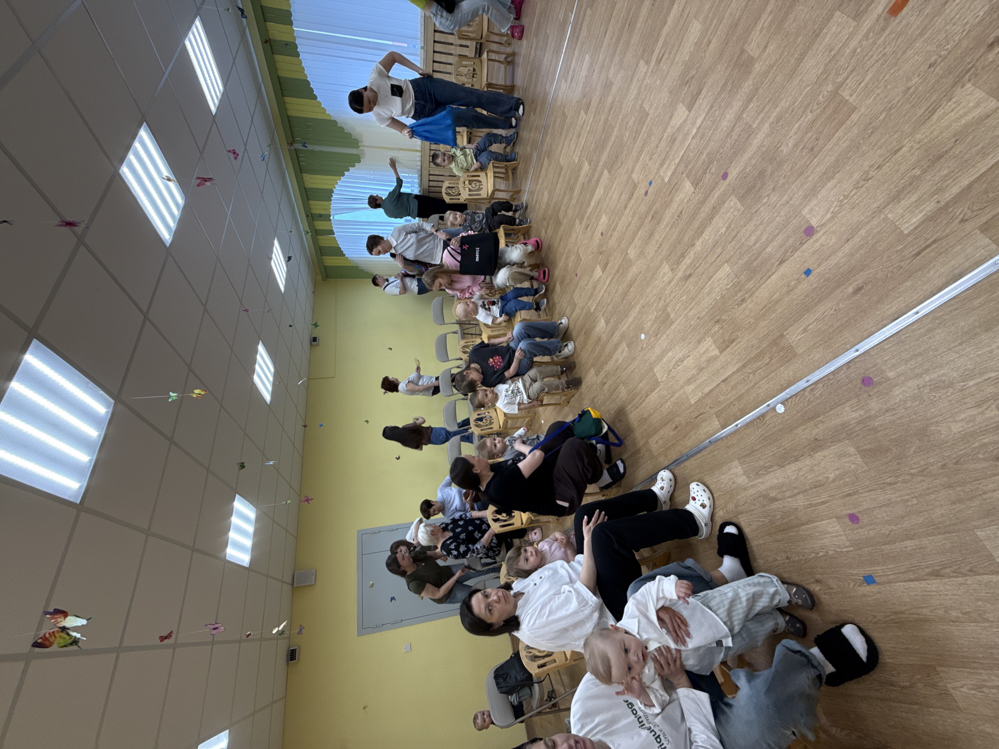 Community gathering observed in decorated room in Шебунино, Russia