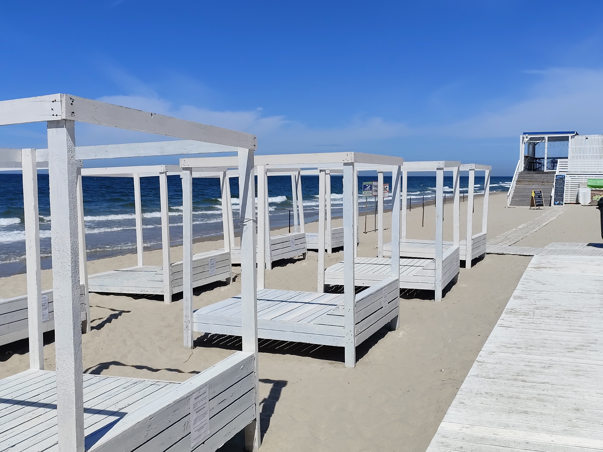 Sunny day at Yantarny's sandy Baltic beach