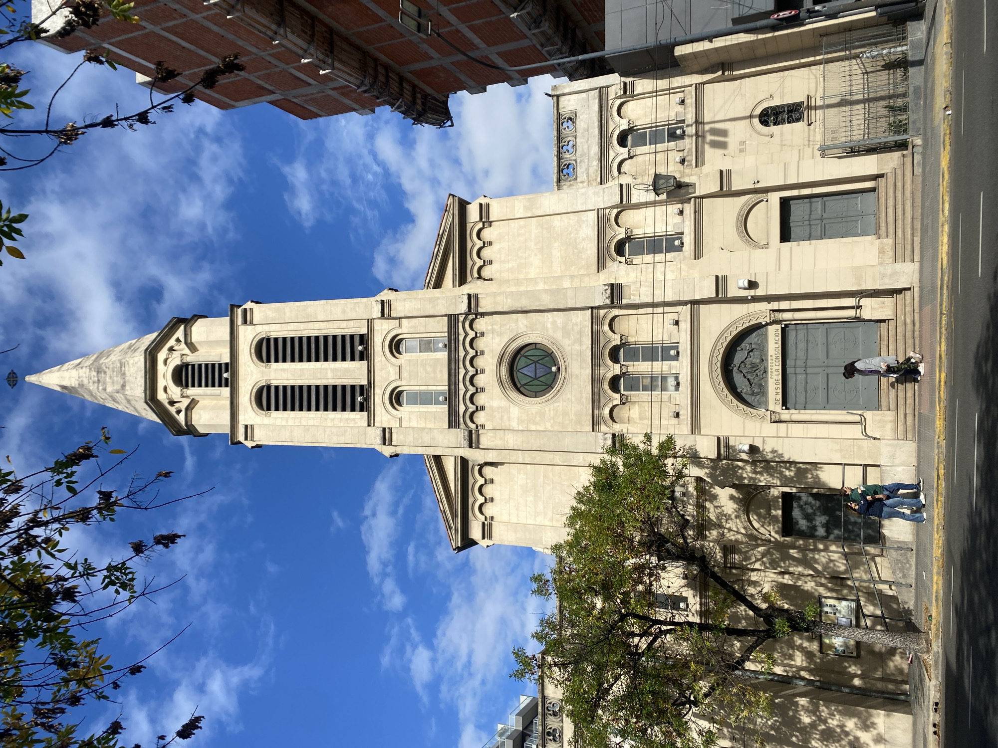 Multiple church buildings documented in Buenos Aires evening