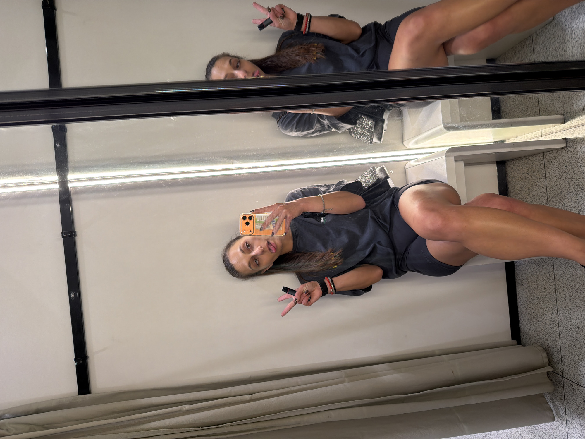 Fitting room mirror selfies in a Plovdiv retail store