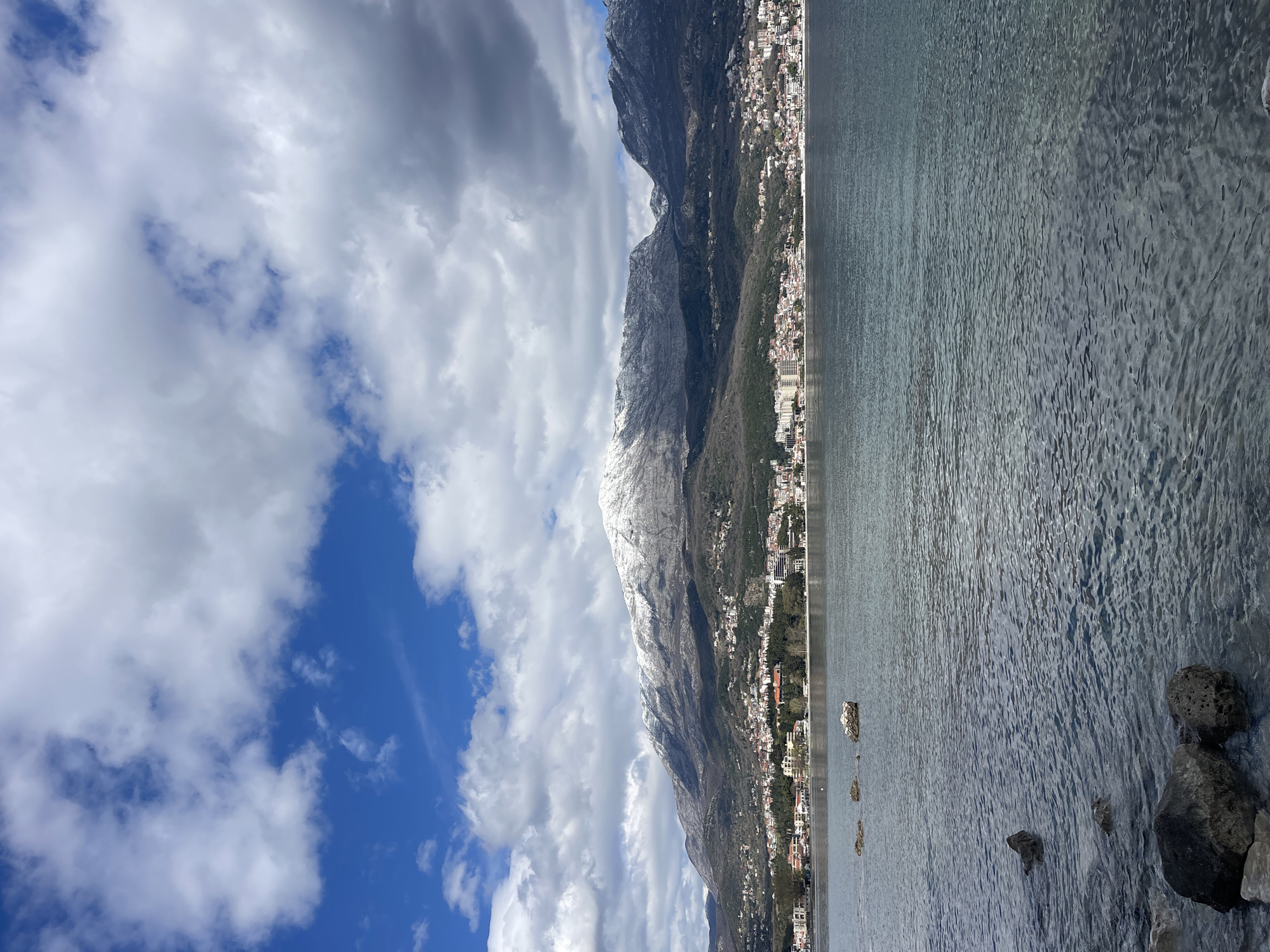 Snow-covered mountains and calm waters observed in Montenegro