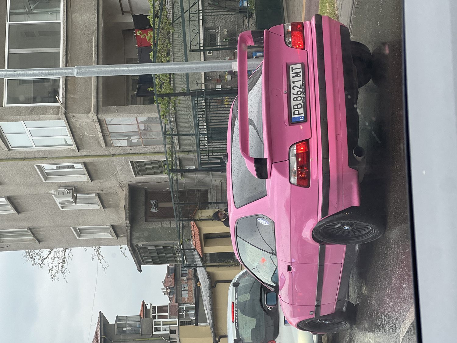 Pink BMW coupe spotted on wet Plovdiv street