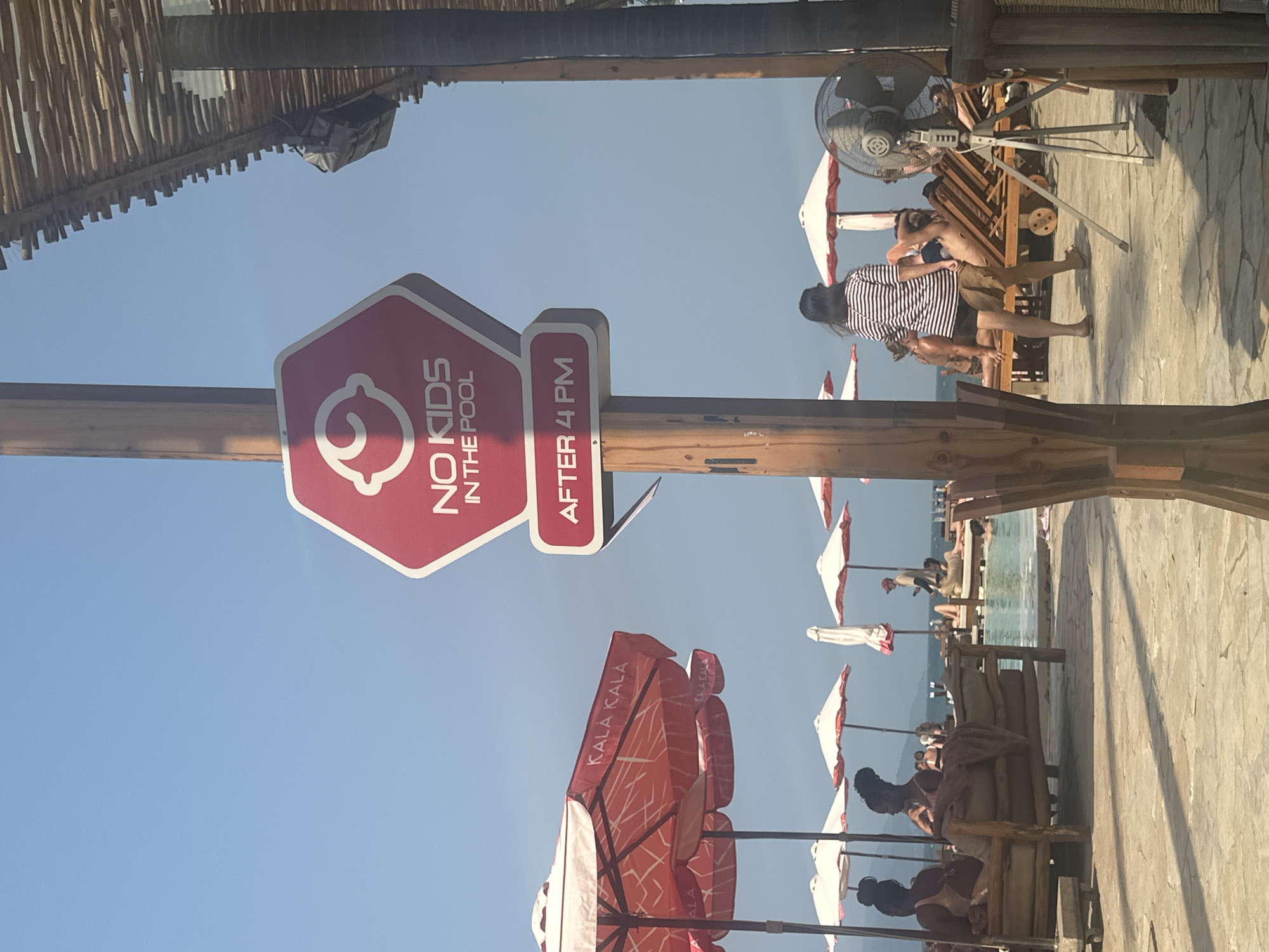 Pool hours sign restricts kids after 4PM at Vietnam resort
