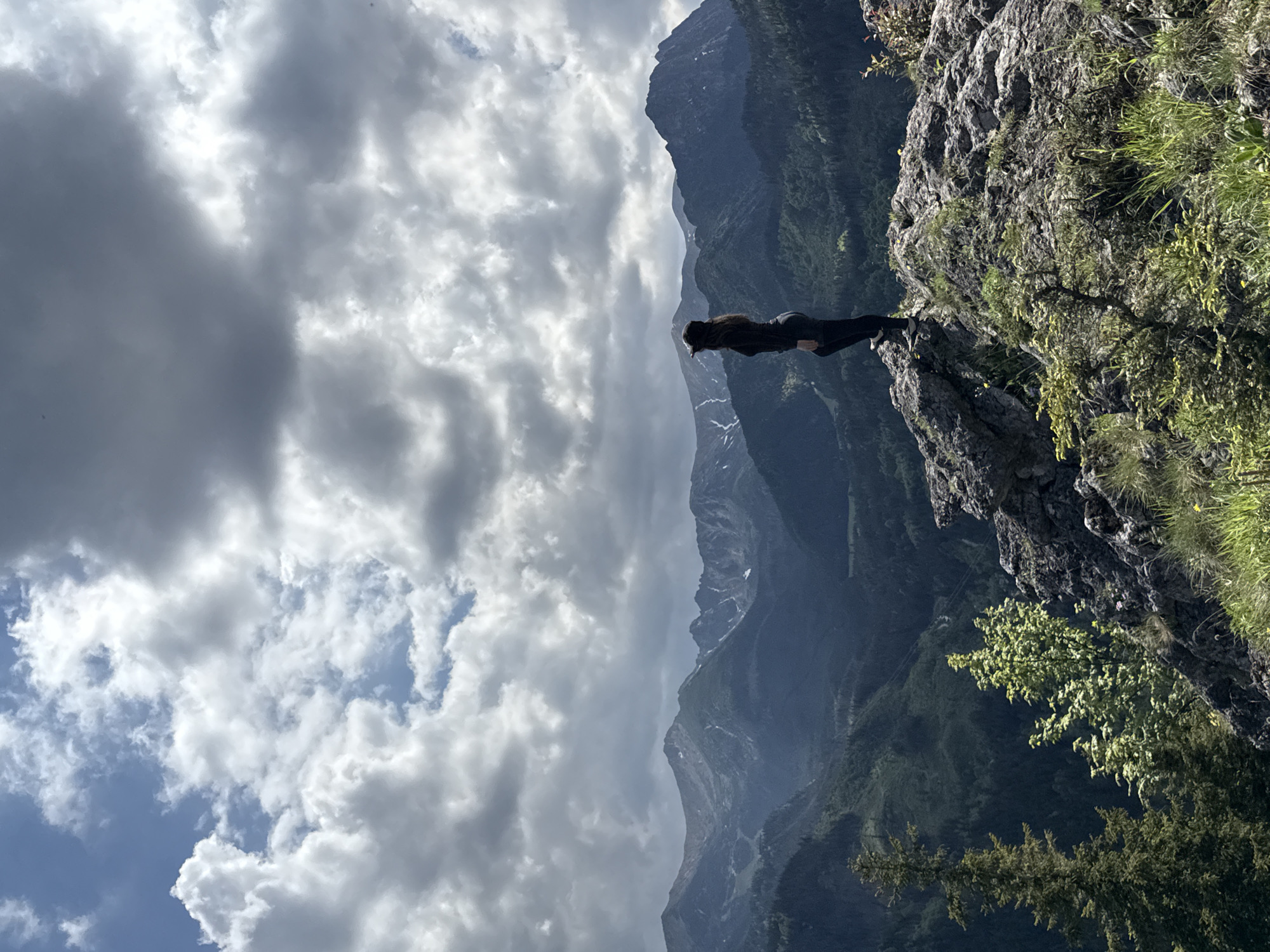 Hikers gather on Tatra Mountain cliffs near Zakopane