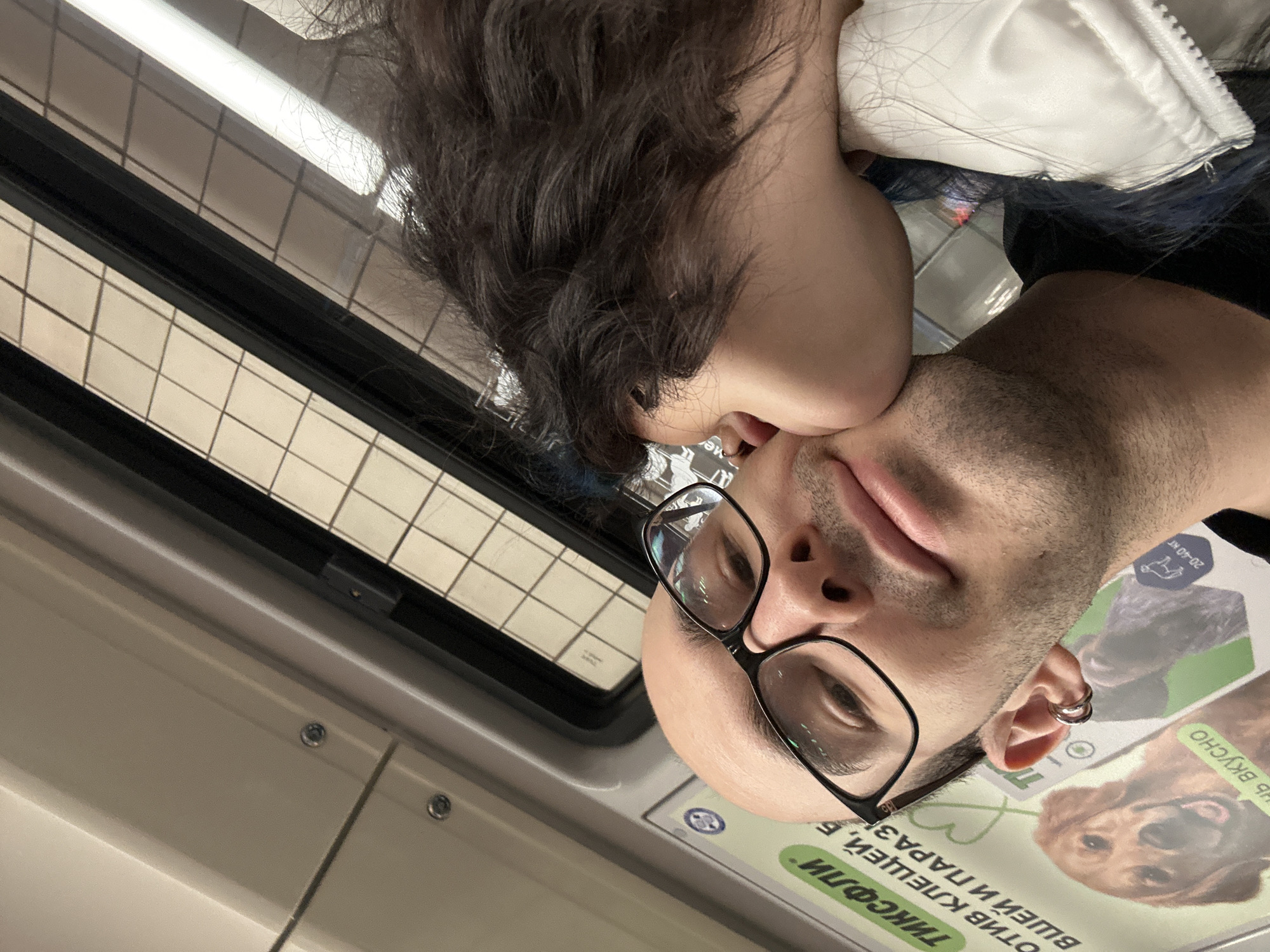 Intimate moment captured between couple in Moscow subway