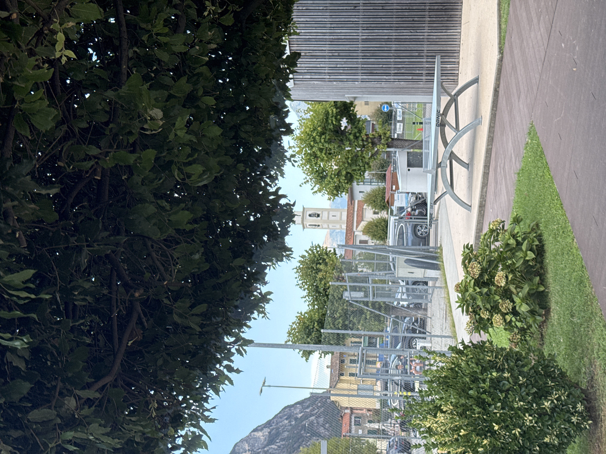 Bocce court and lakefront greenspace along Lake Lugano, Melide