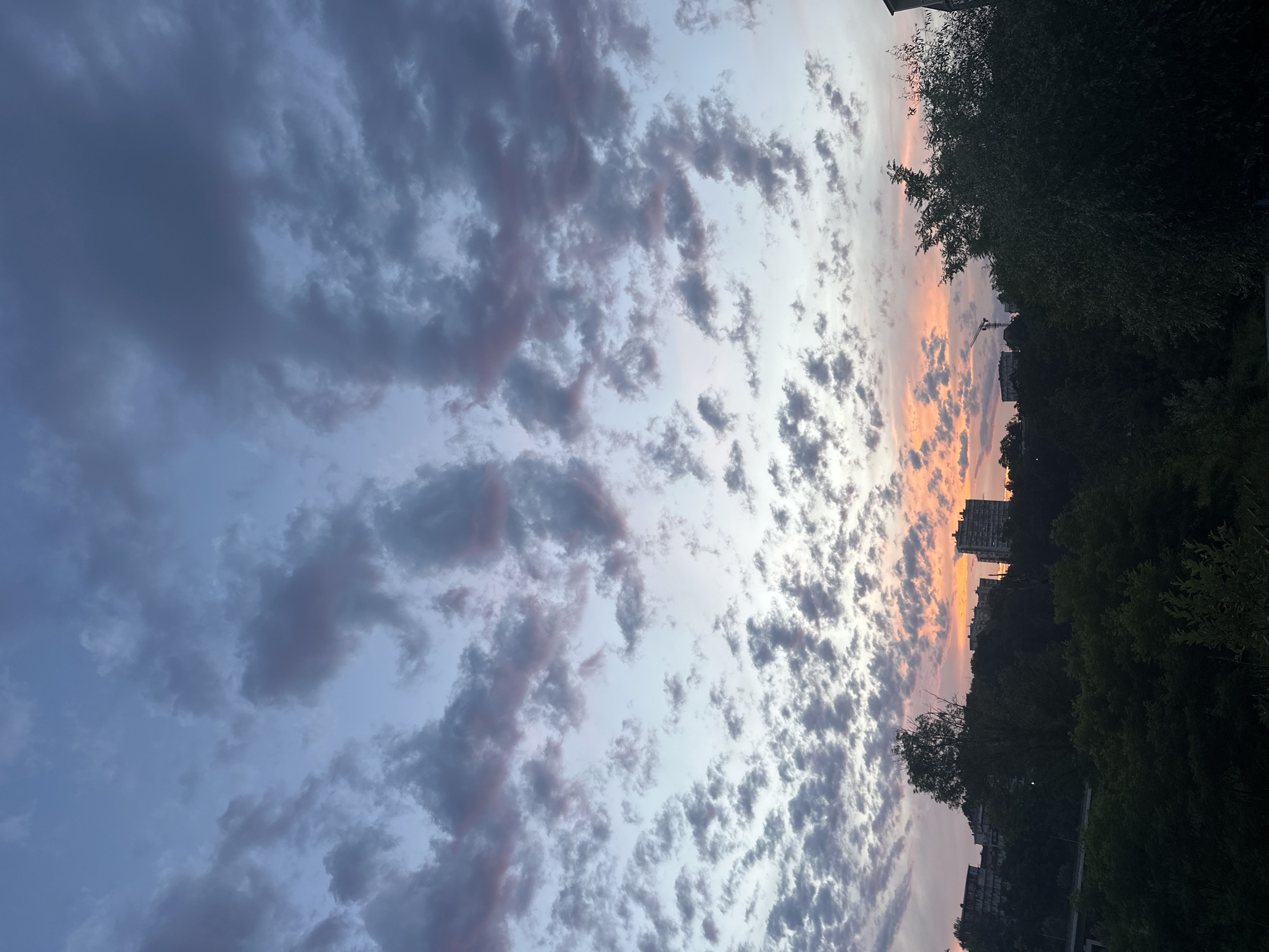 Sunset skies and street life in Razdolnoye, Russia