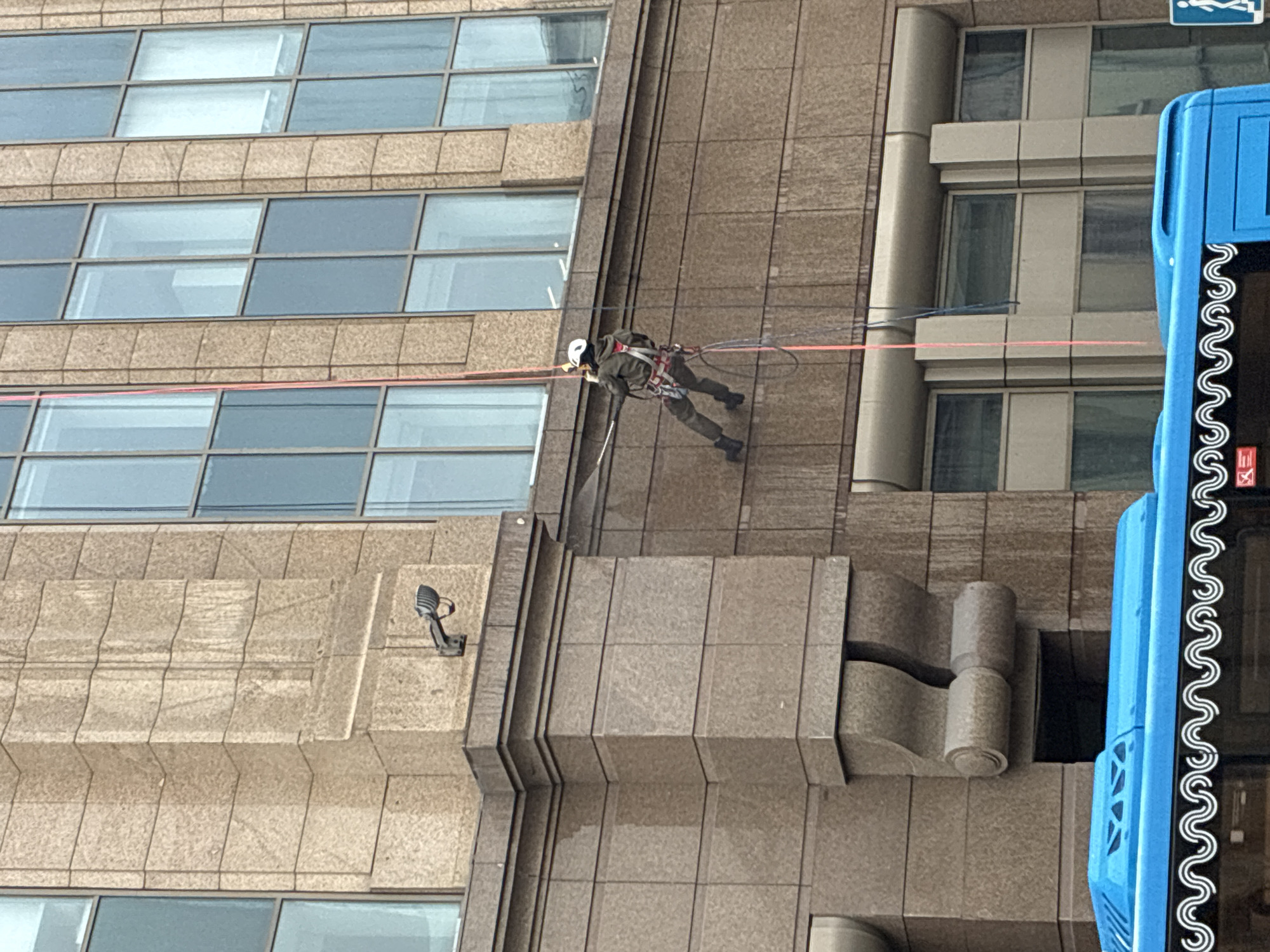 Ordinary Moscow moments: building maintenance, Kremlin views, subway musician