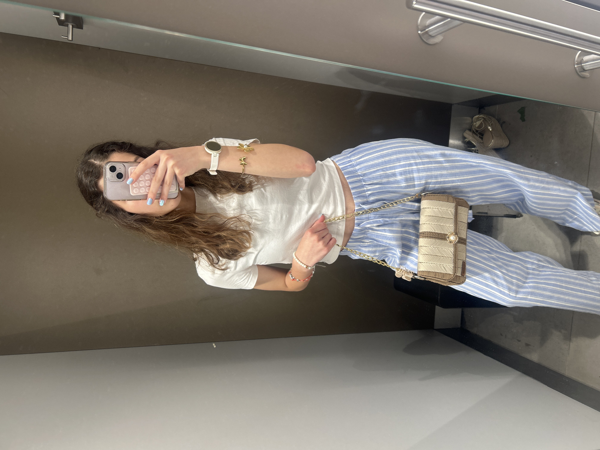 Fitting room outfit try-on session in Ruse