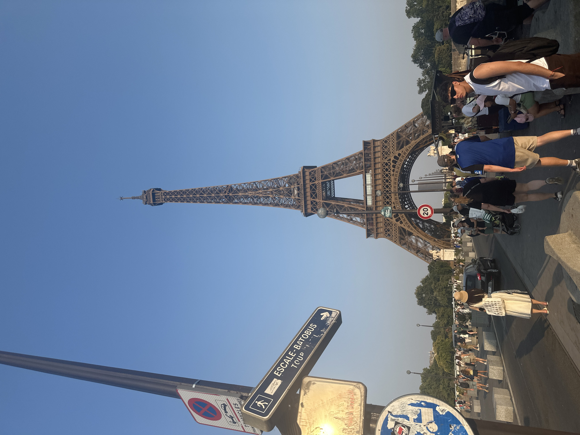 Busy summer afternoon at the Eiffel Tower and Seine