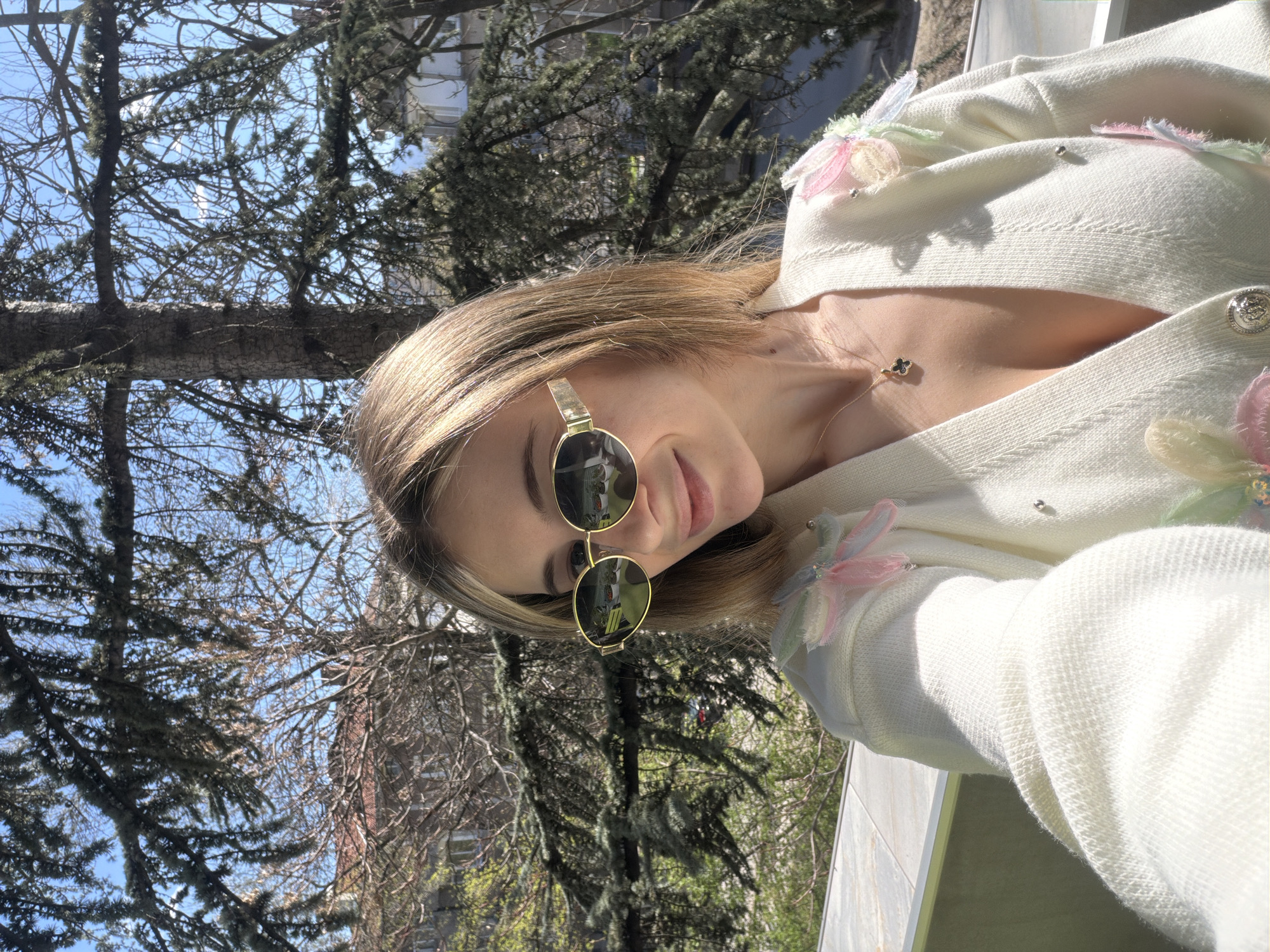 Woman in Stitch onesie relaxes with coffee on Plovdiv balcony