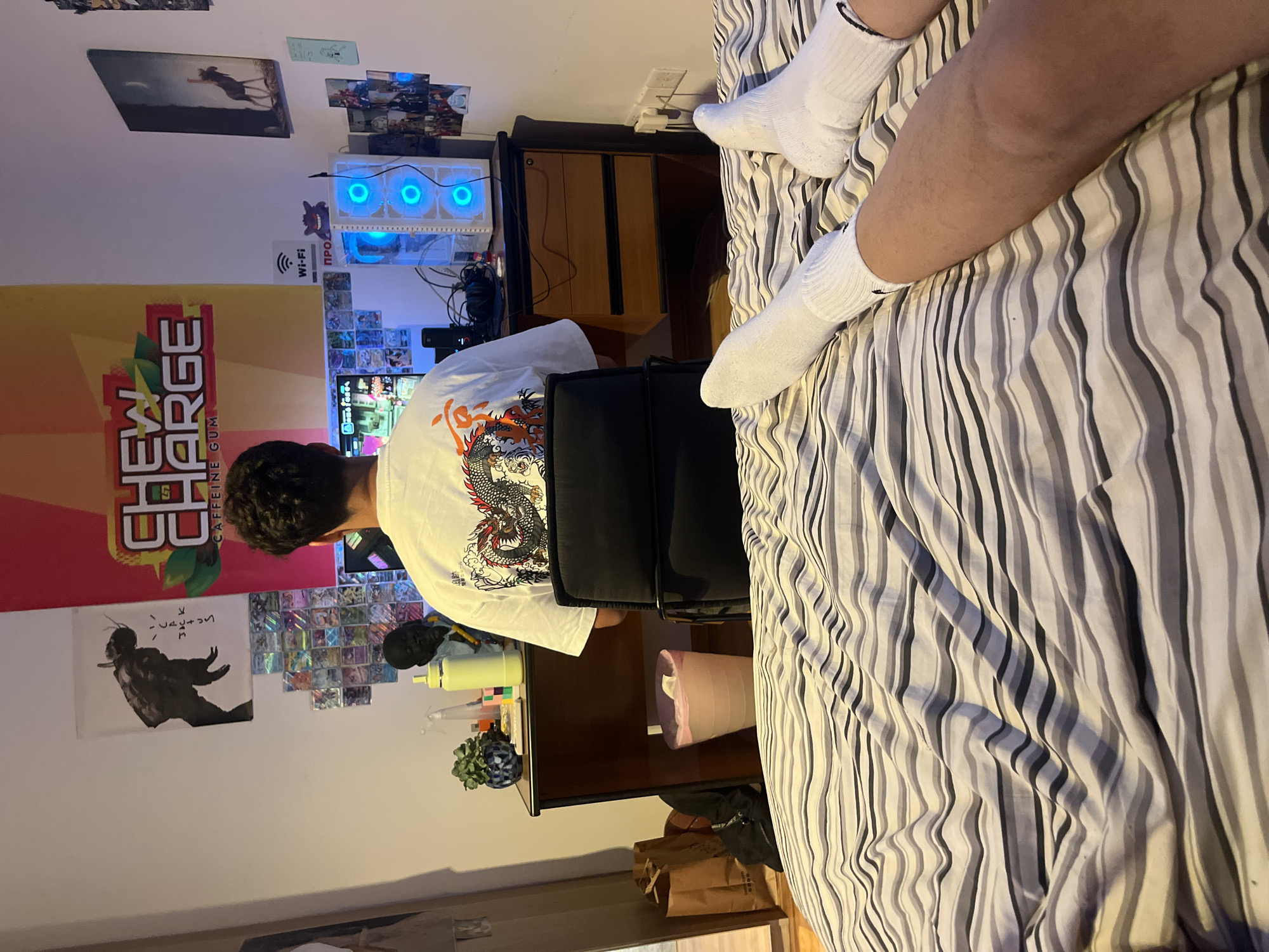 Afternoon gaming session in a Limassol bedroom, July 2026.