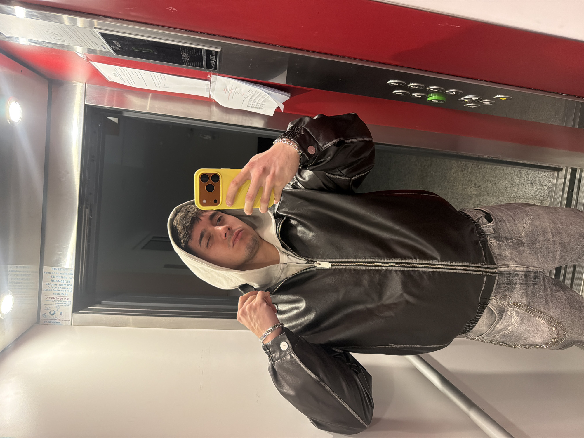 Young man takes elevator selfies in Sofia, Bulgaria