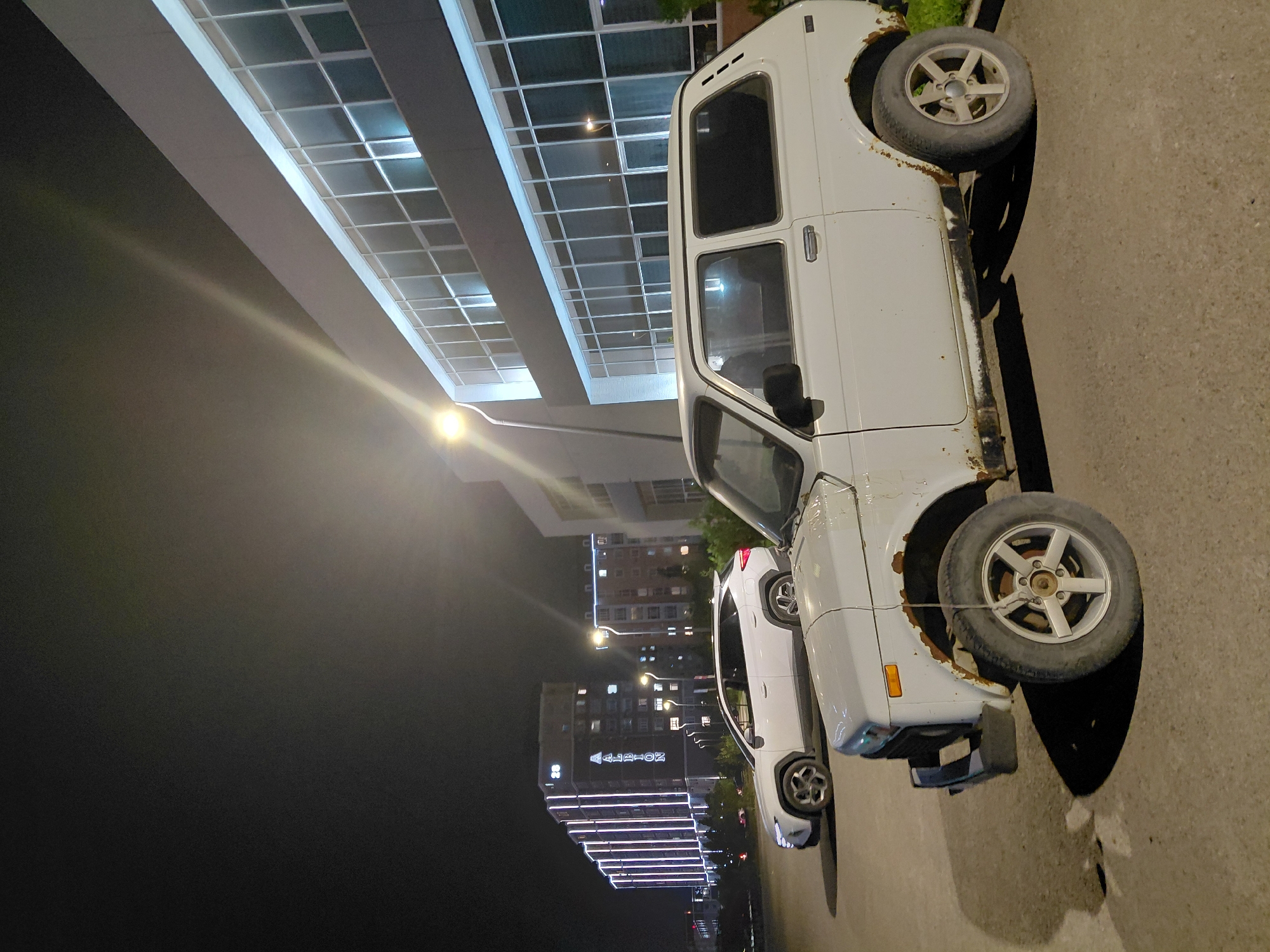 Aktau at night: lit pathways and modern architecture
