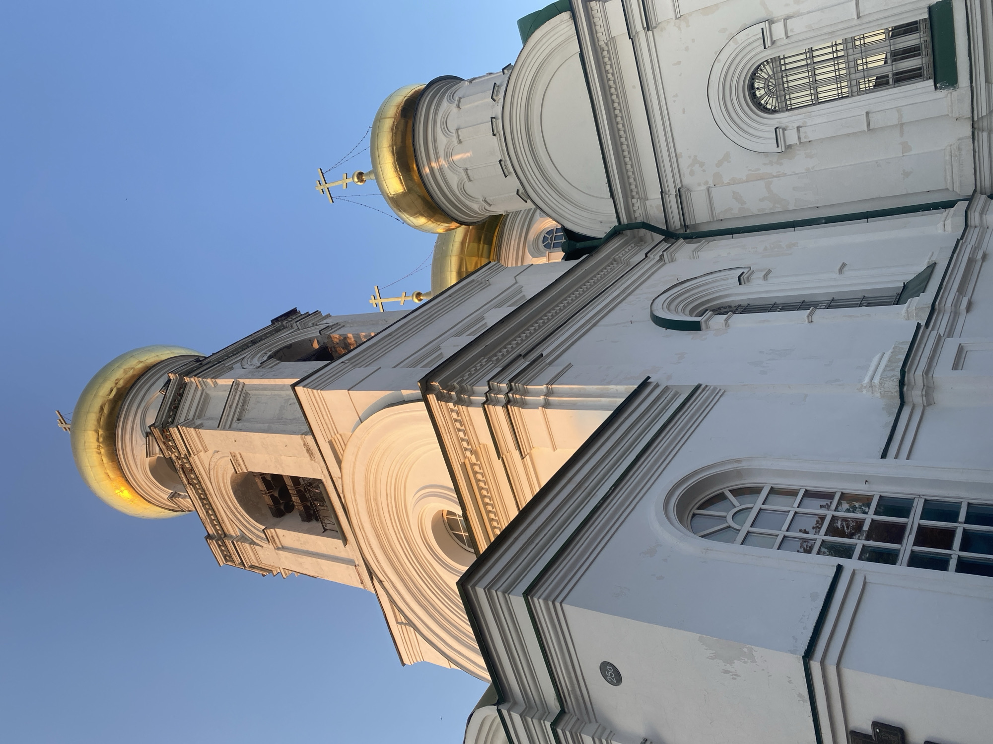 Nizhny Novgorod churches, skyline, and street scenes at golden hour