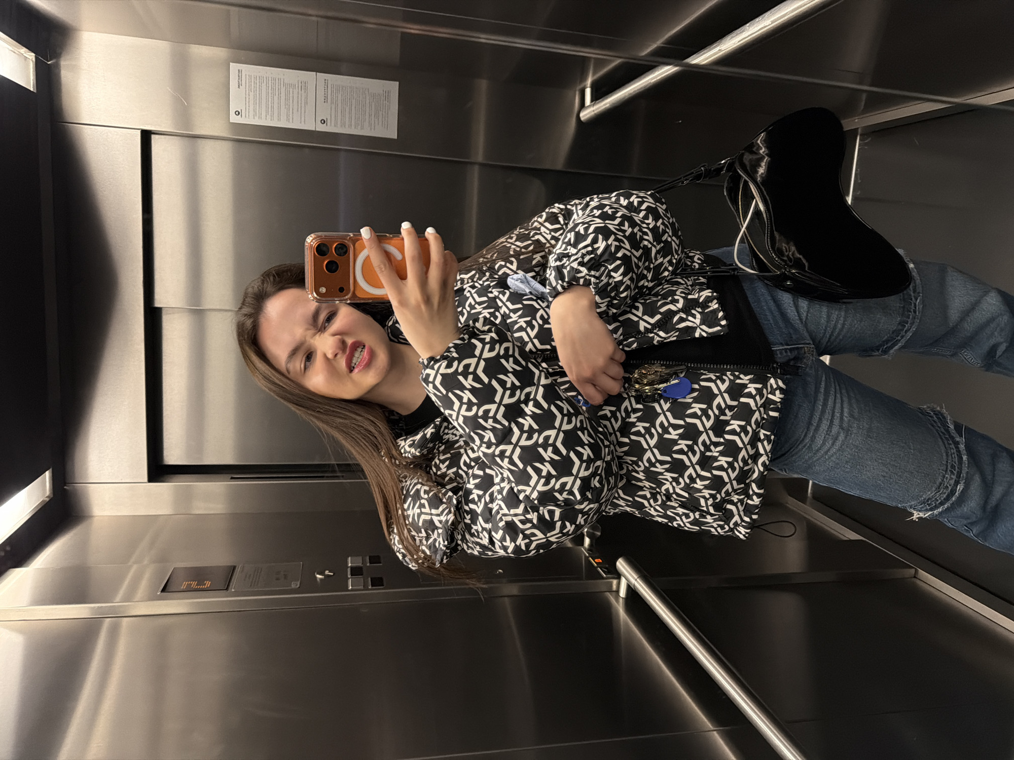 Woman takes elevator selfies in Sofia building