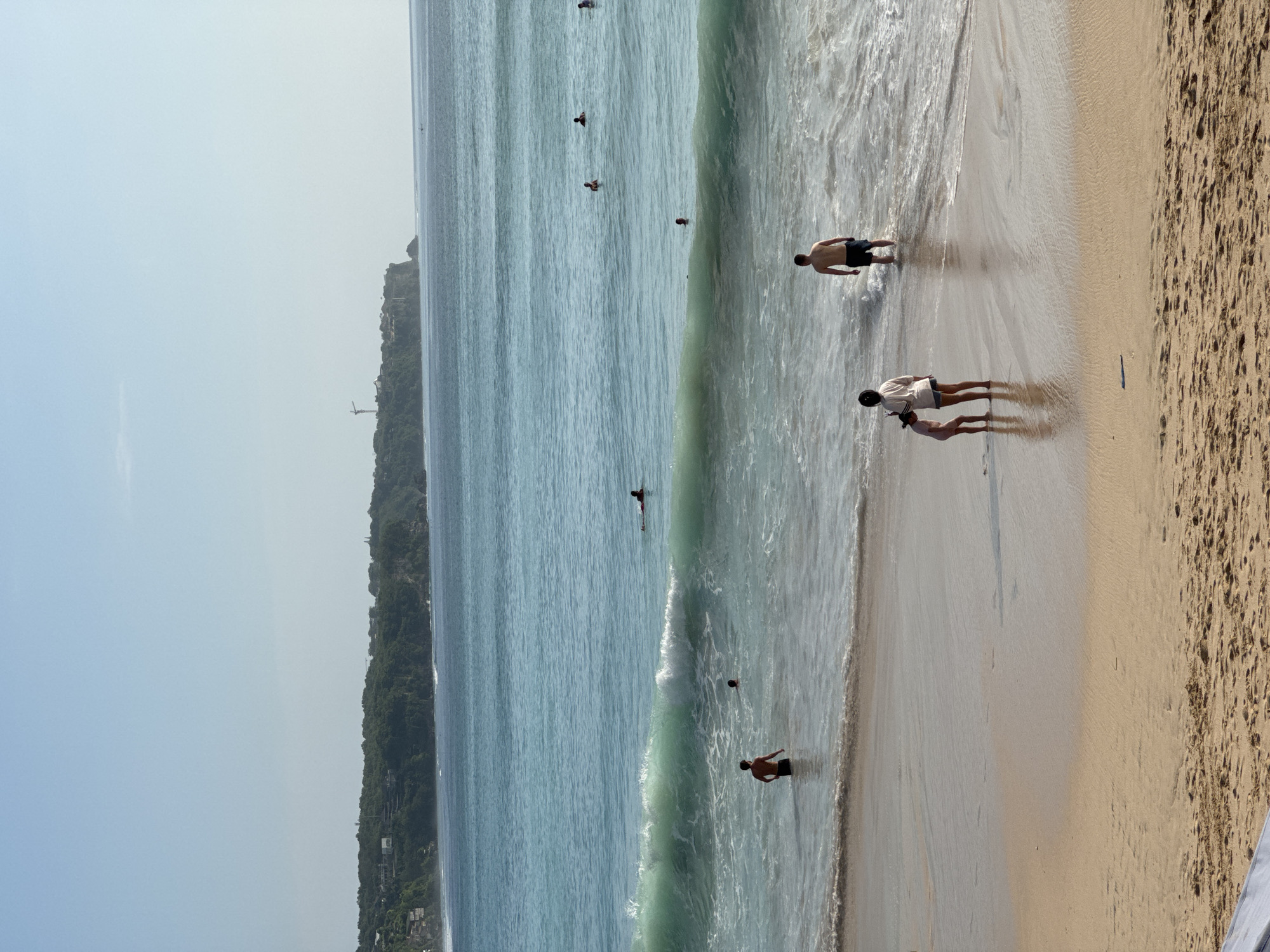 Morning beach activities captured at Kuta Selatan, Indonesia