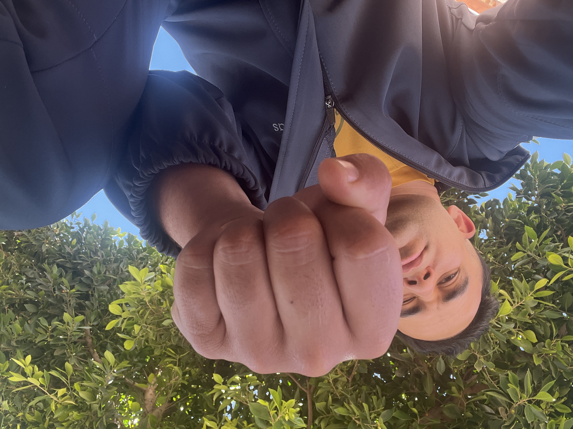 Young man poses with raised fist in Morocco