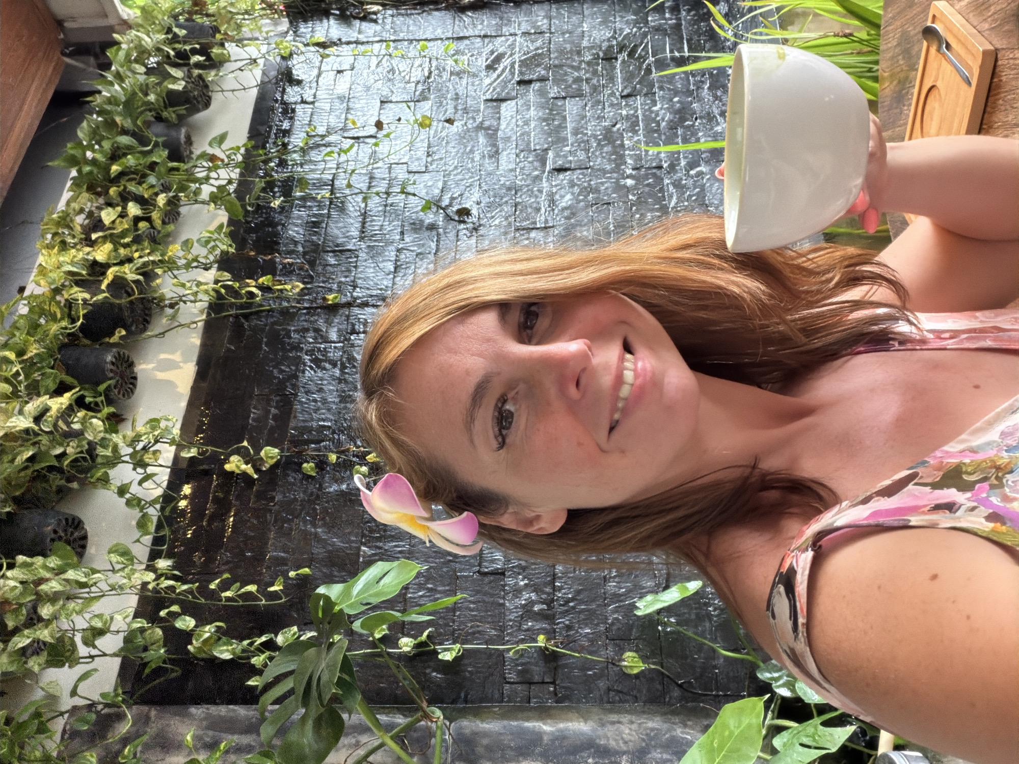 Green drink and floral dress at a Chiang Mai café