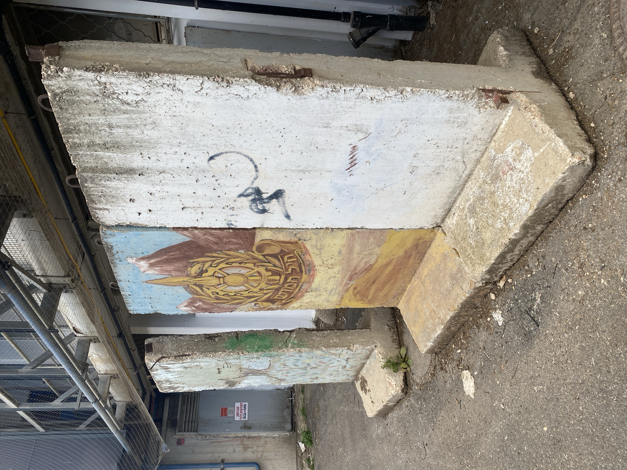 Concrete memorial or art installation observed in Haifa