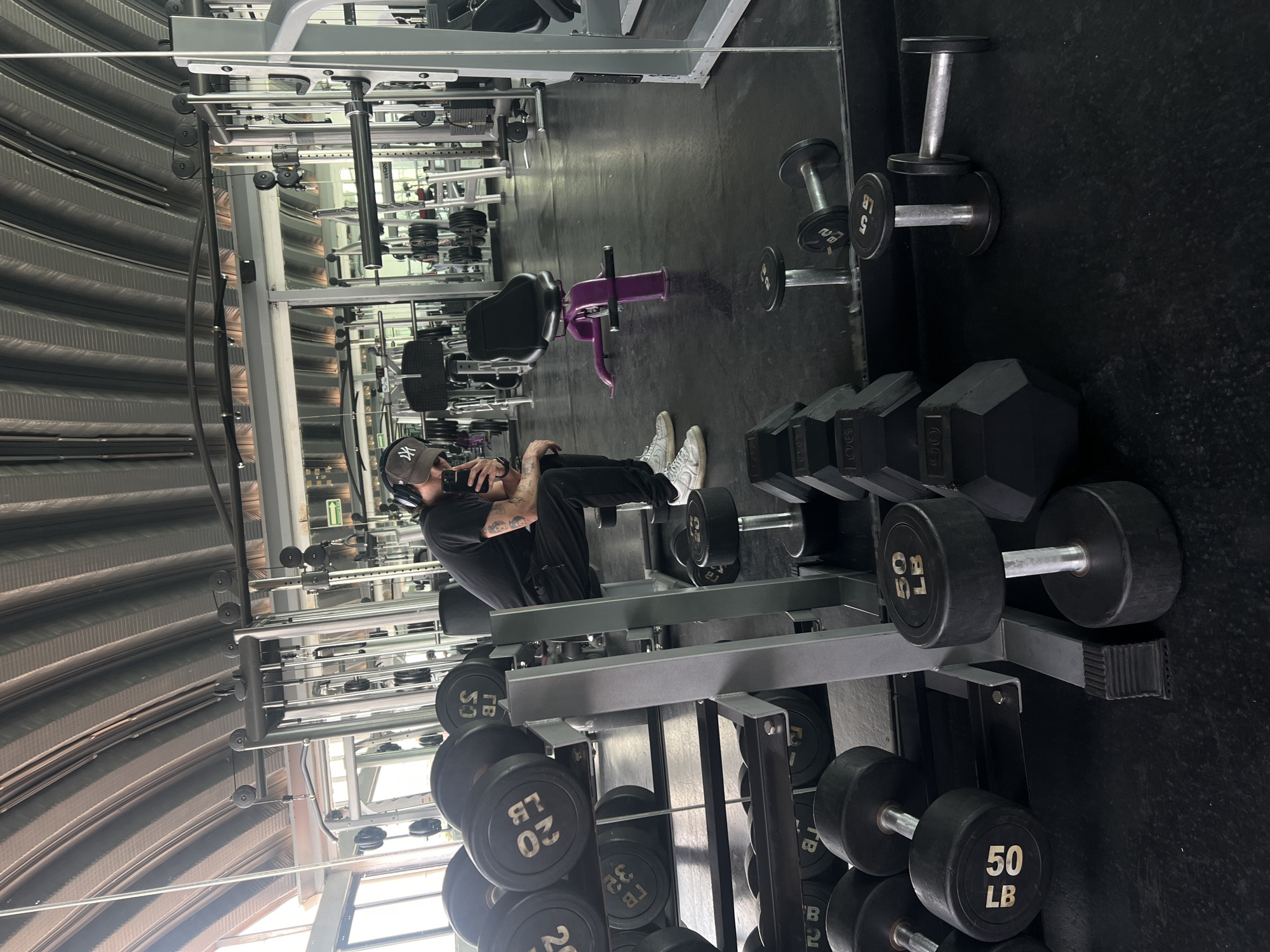 Person in athletic wear sits in Mexico City gym