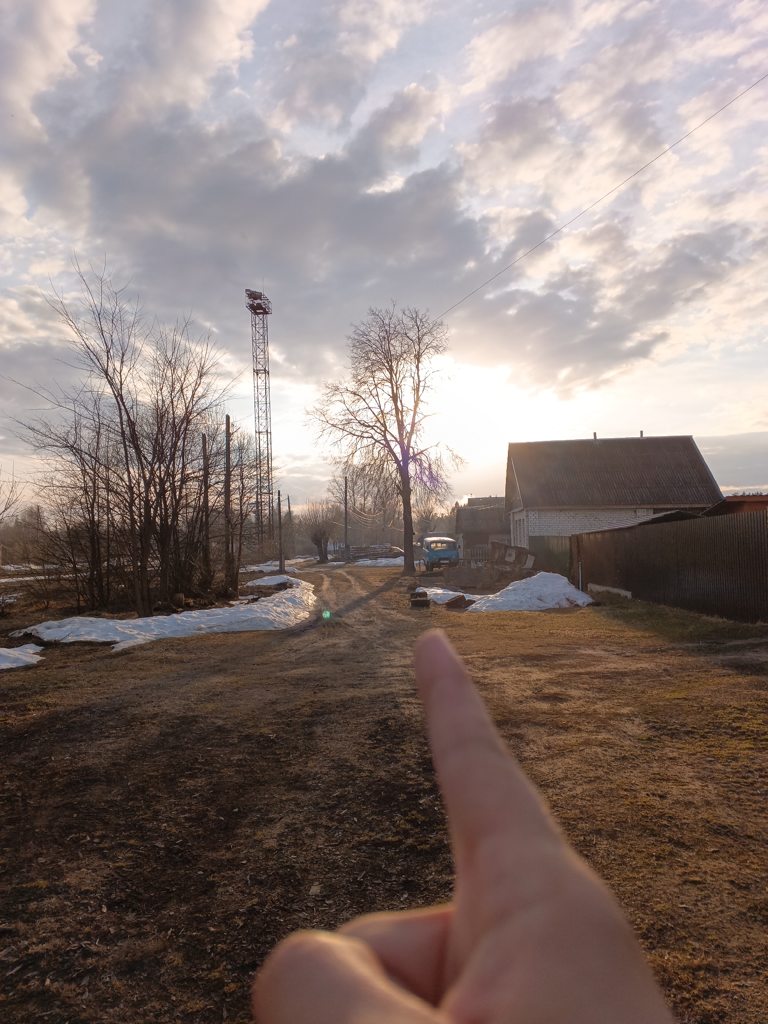 Young man captures spring selfies in rural Andreyevo, Russia