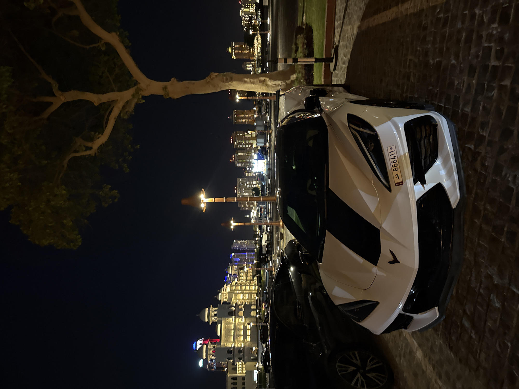 White Corvette spotted near Boho Social restaurant in Doha