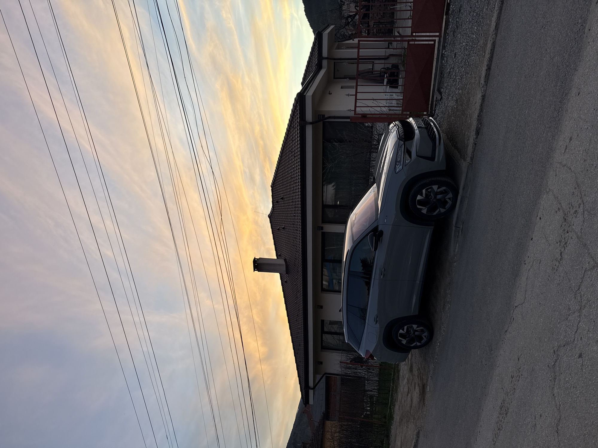 Grey SUV parked by house in Etropole, Bulgaria