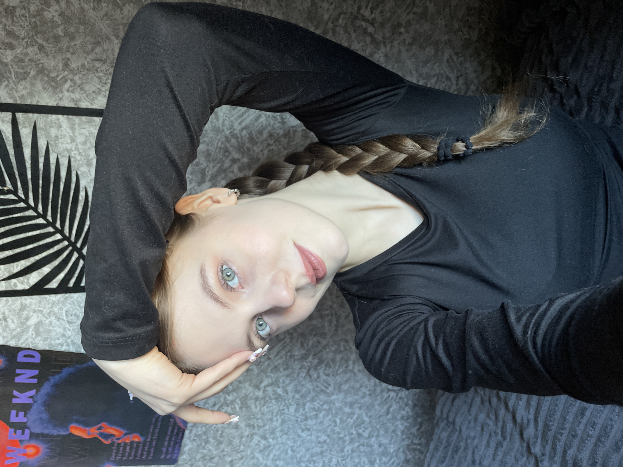 Woman rests on sofa in Foki, Russia