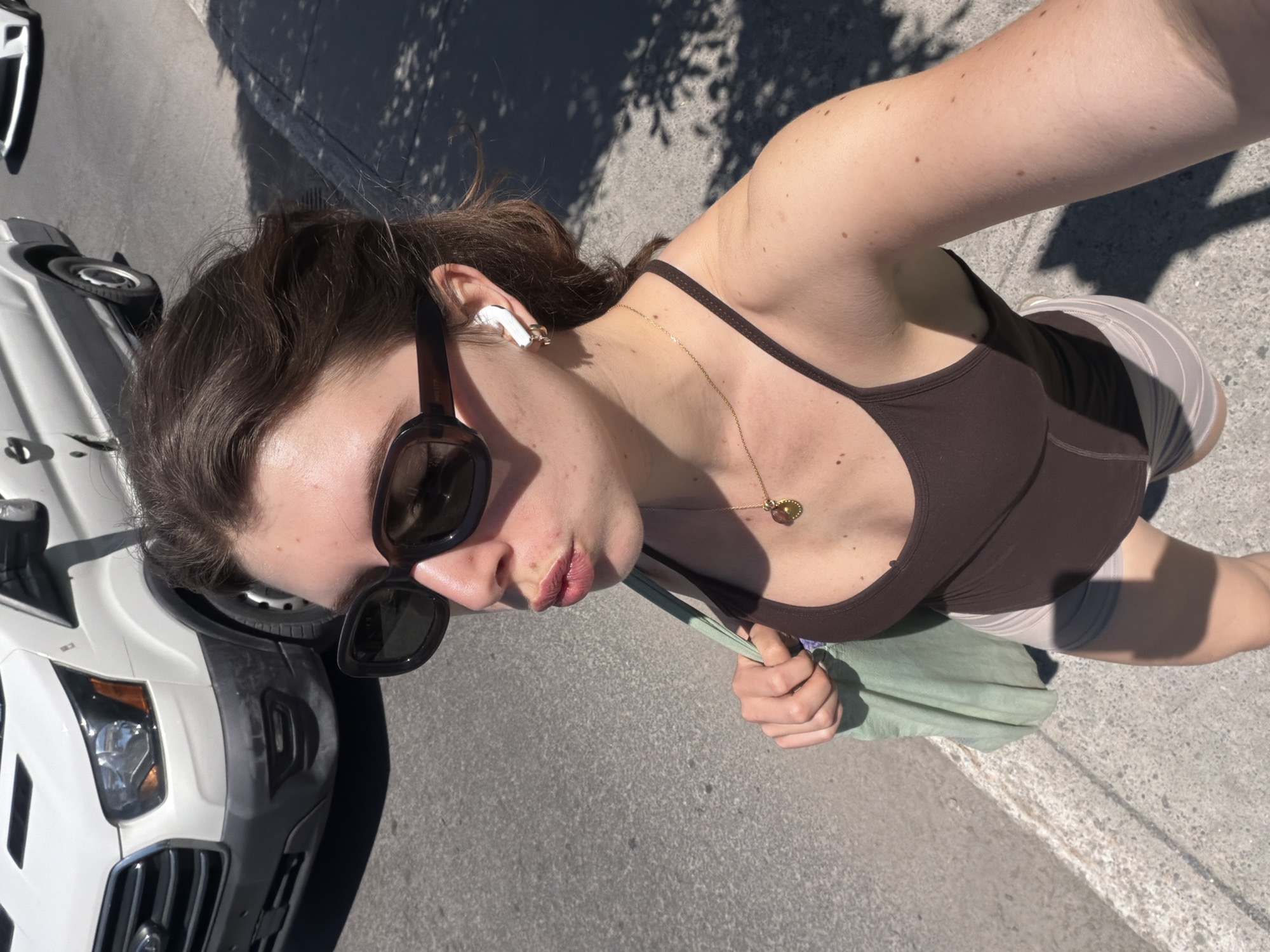 Woman photographed on sunny Montreal street afternoon