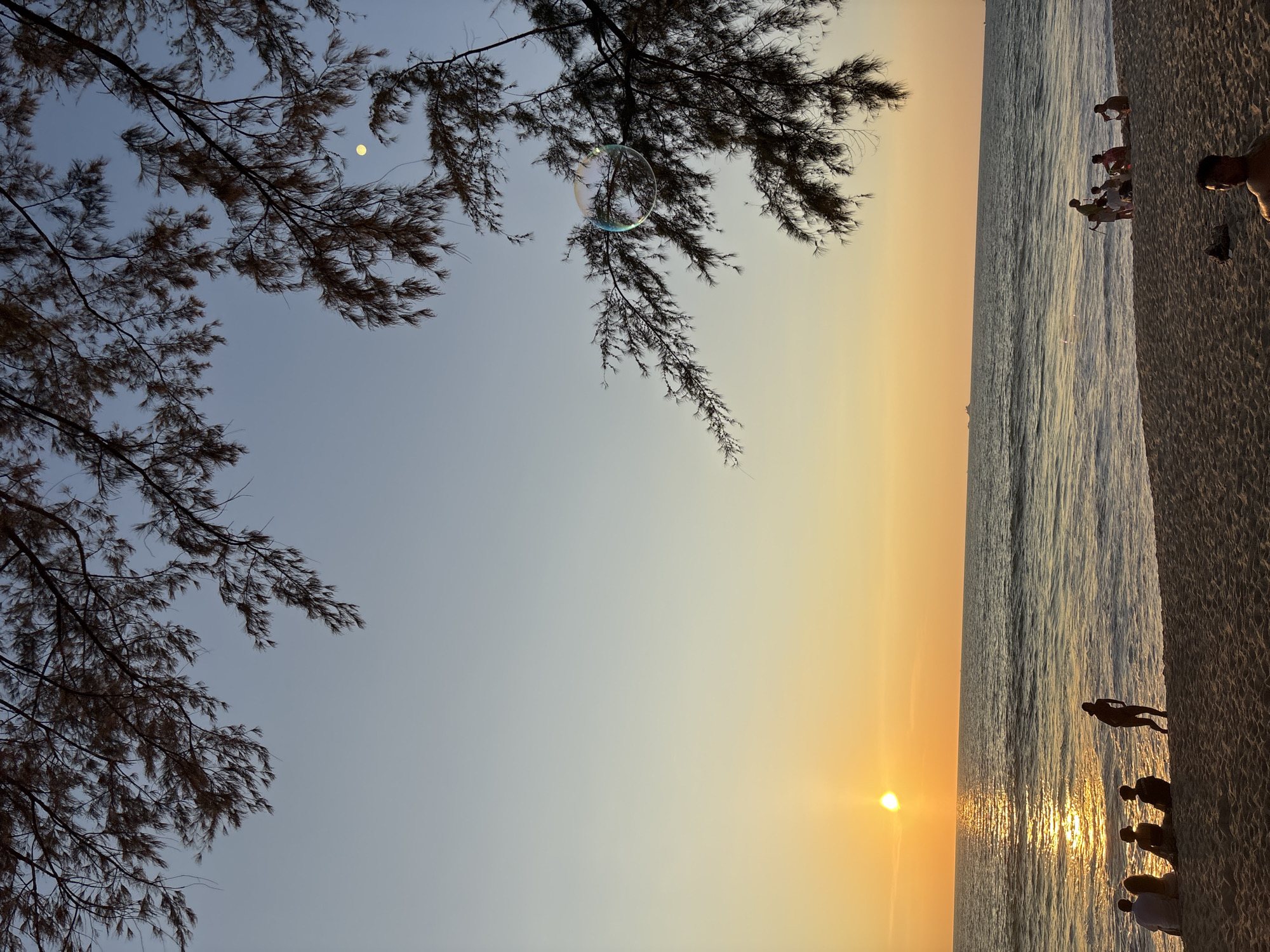 Sunset observed over ocean at Choeng Thale beach, Thailand