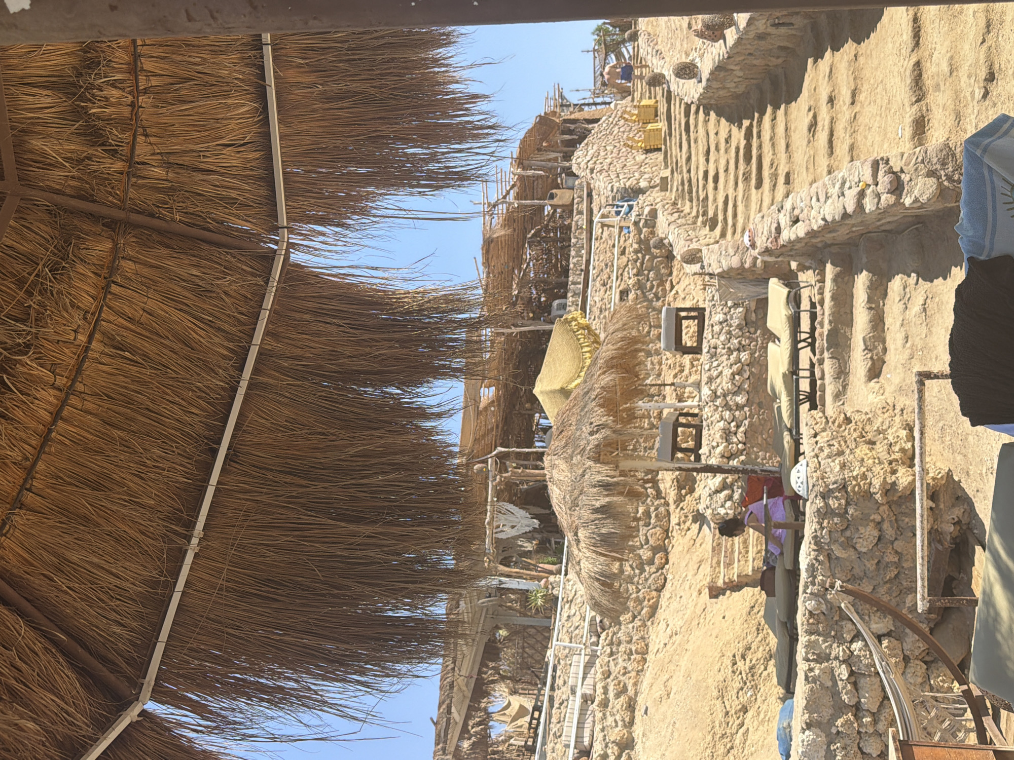 Thatched beach setup along the Sharm El Sheikh shoreline