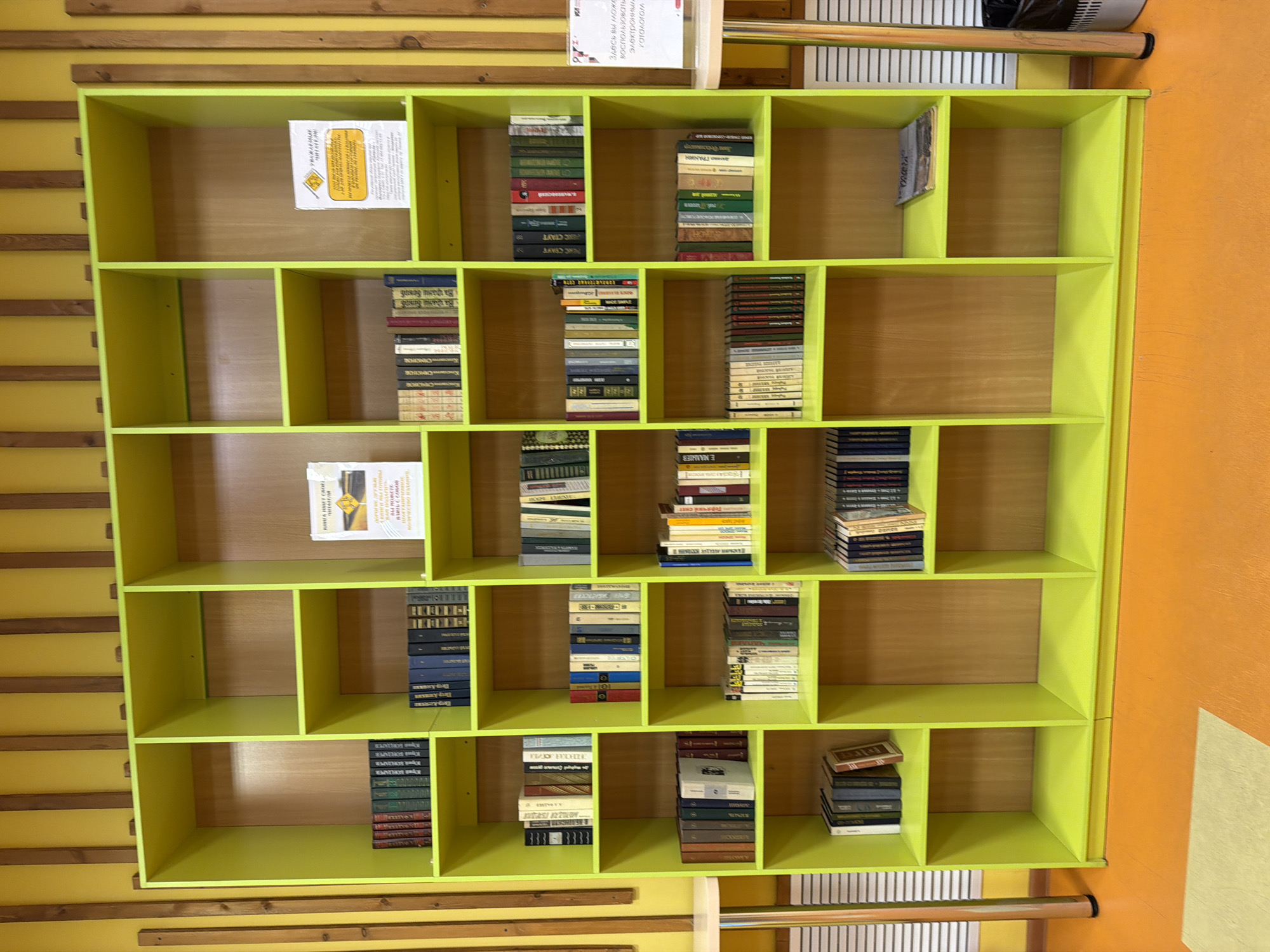 Interior spaces documented in Murmansk including charity donation box