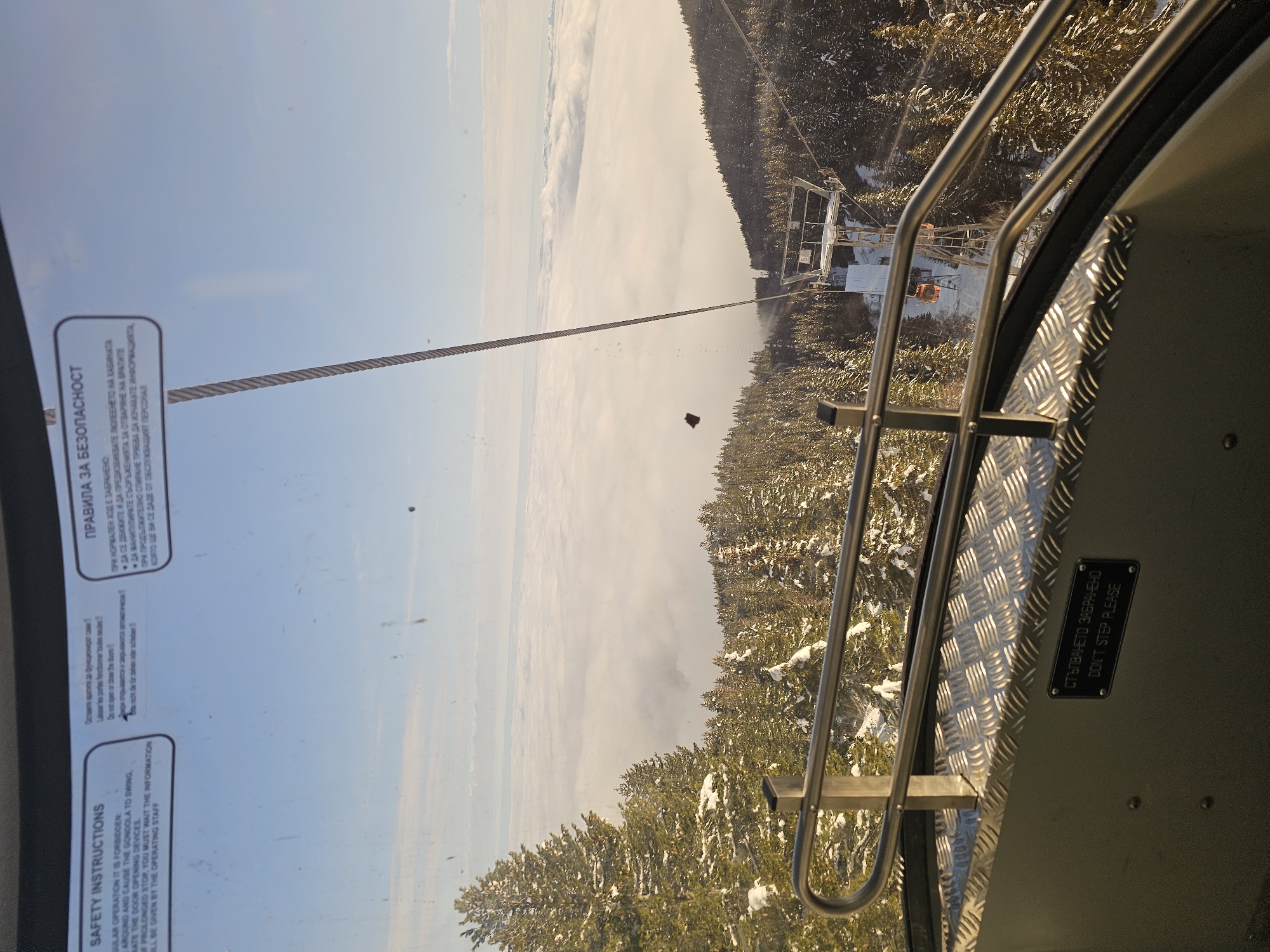Gondola rider captures winter landscape view in Samokov, Bulgaria