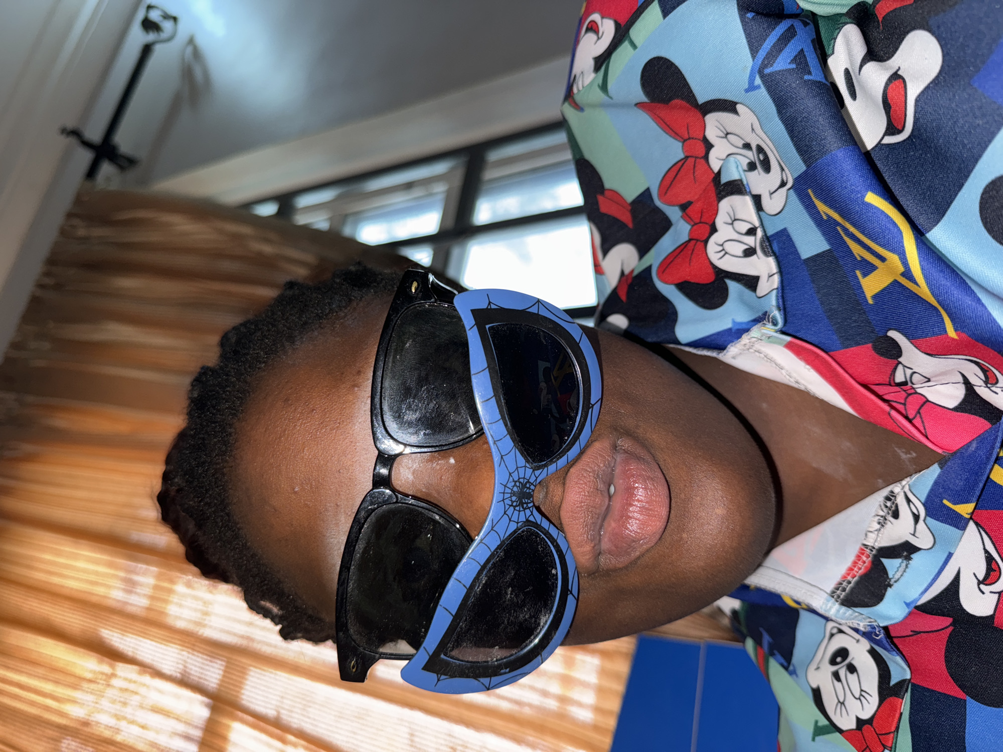 Playful photo session with costume accessories in Nigeria bedroom