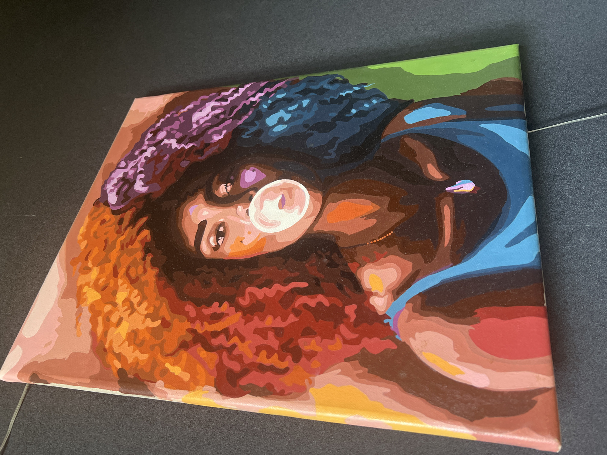 Colorful artwork and stickers on surfaces in Bucha