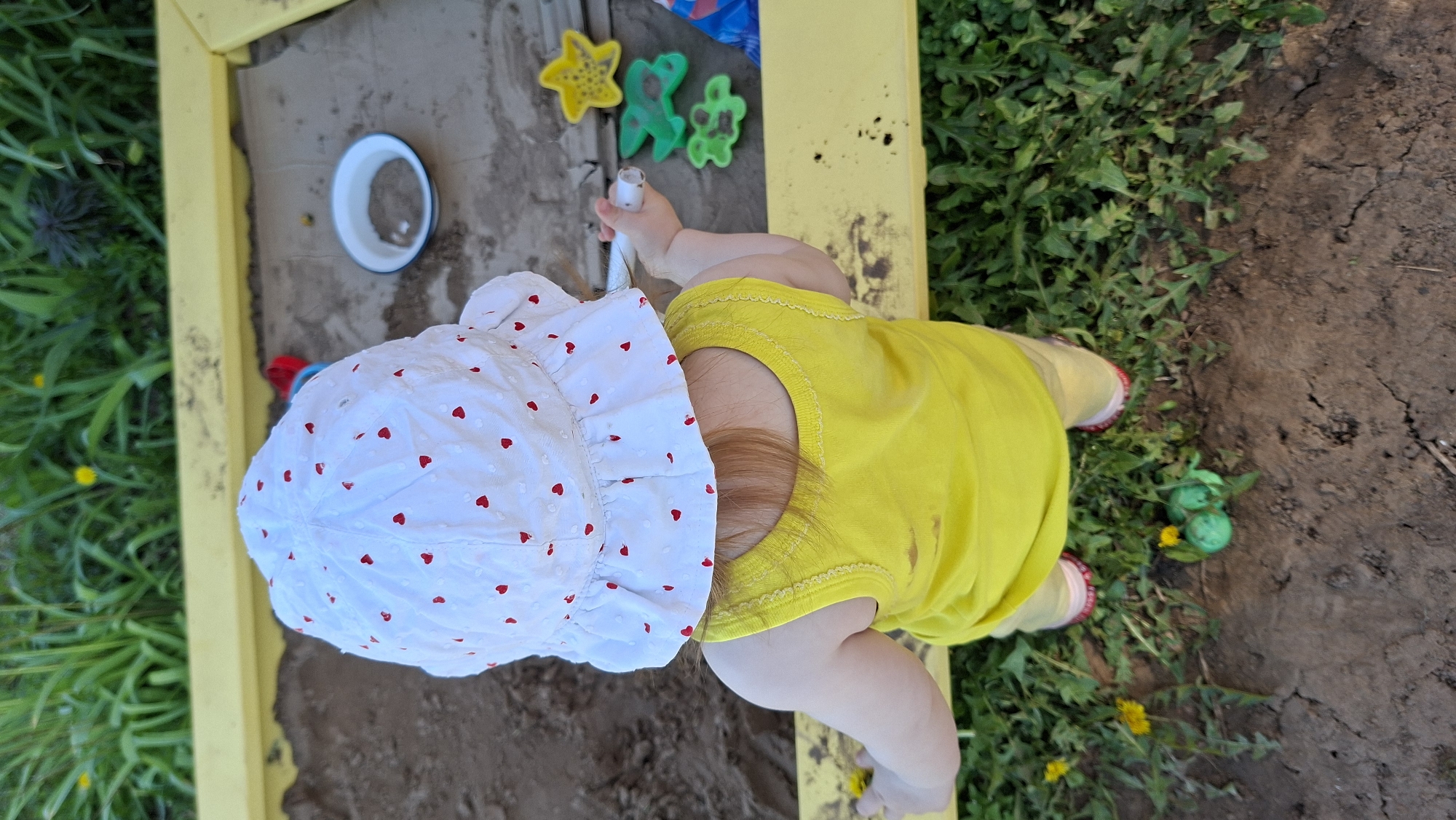 Spring morning activities captured in Russian village playground area