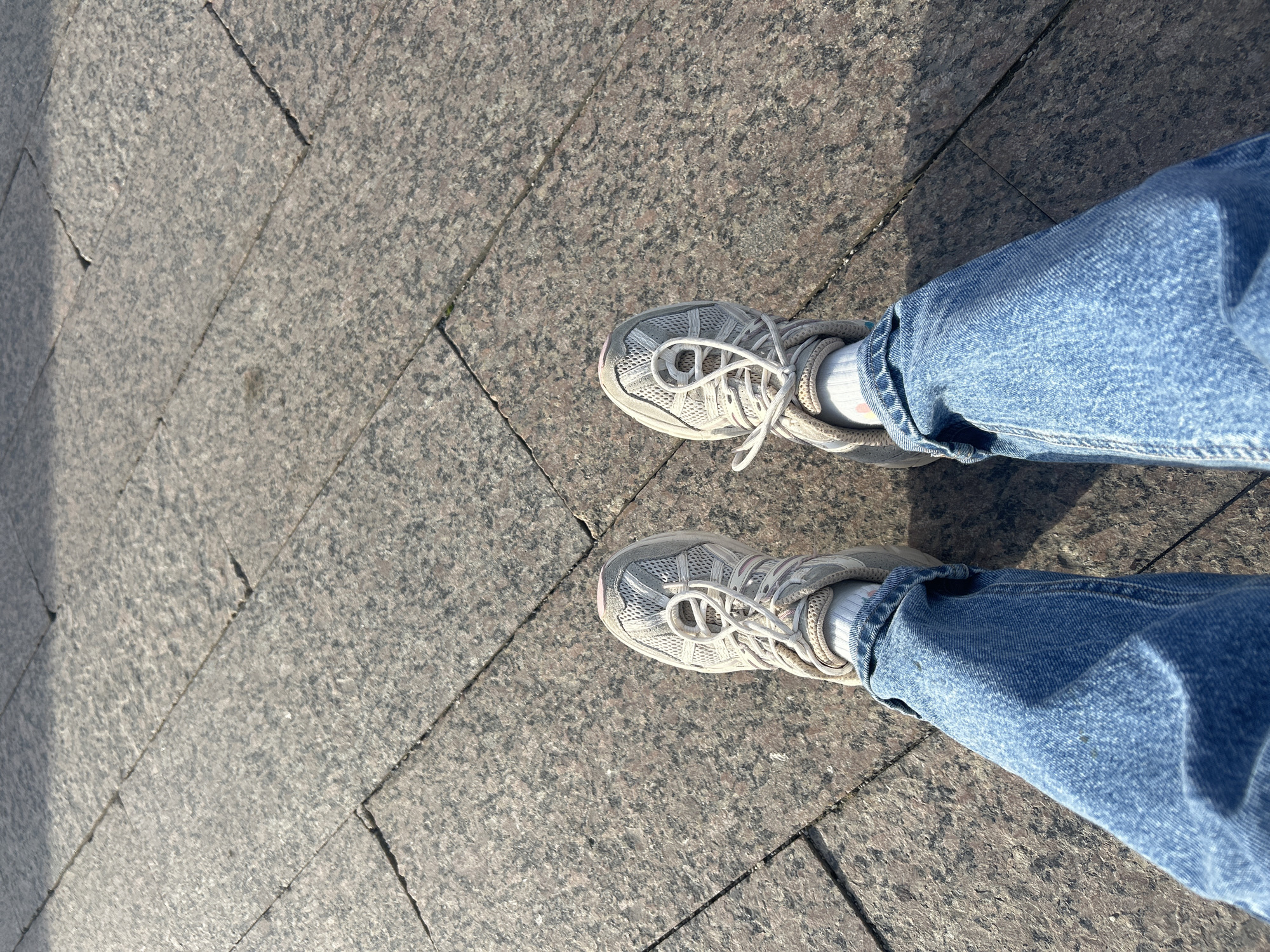 Person documents sunny afternoon moments across central Moscow cityscape