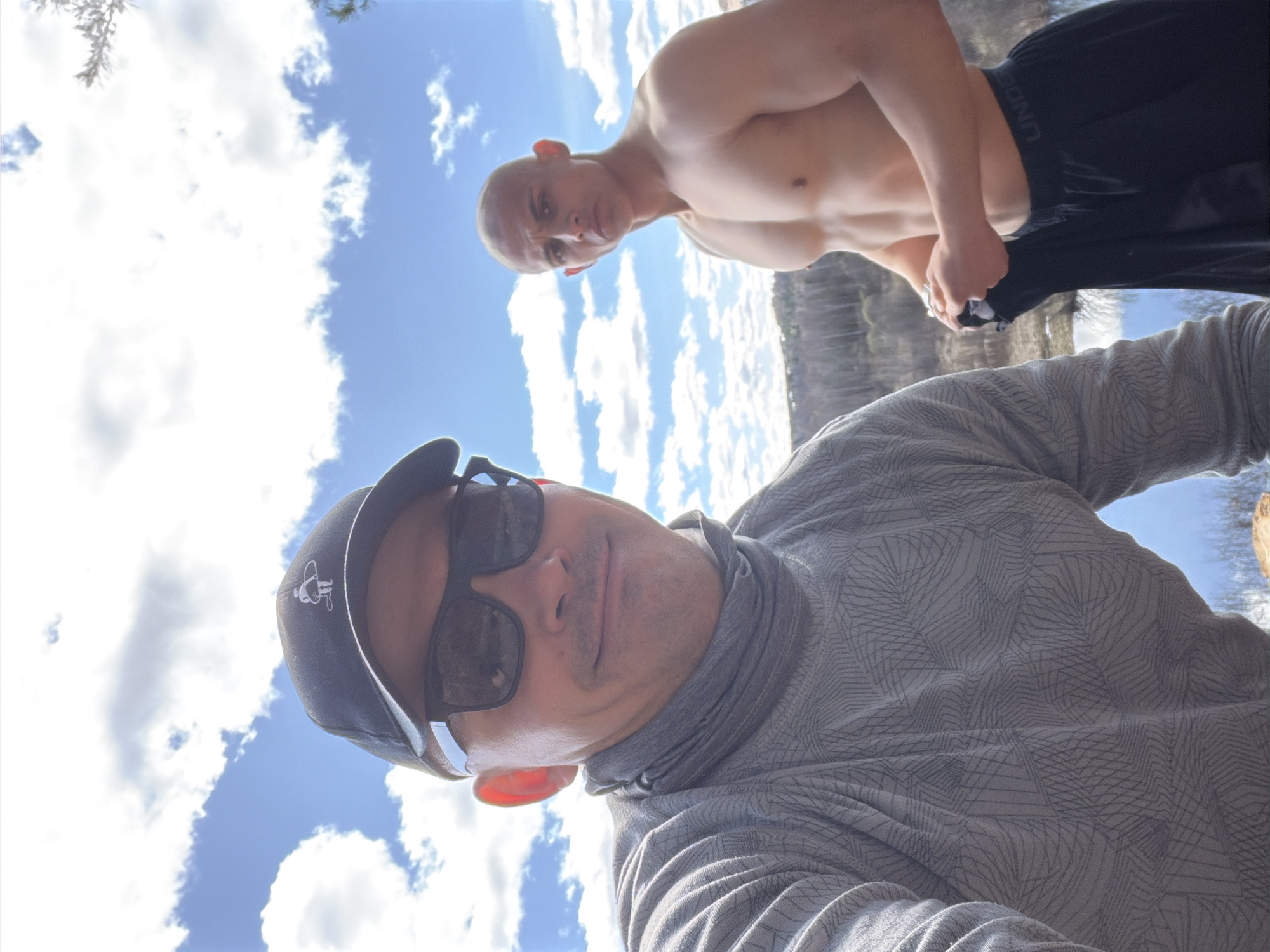 Two men take sunny day selfie in Izhevsk, Russia