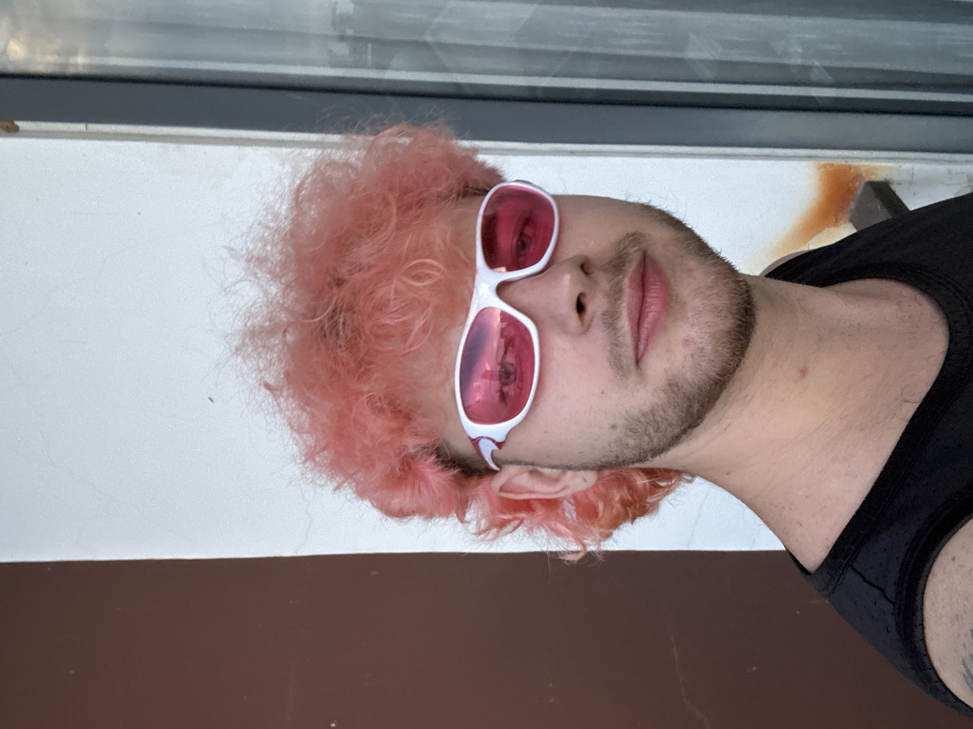 Balcony hangout at dusk in Đà Nẵng, pink hair and drinks