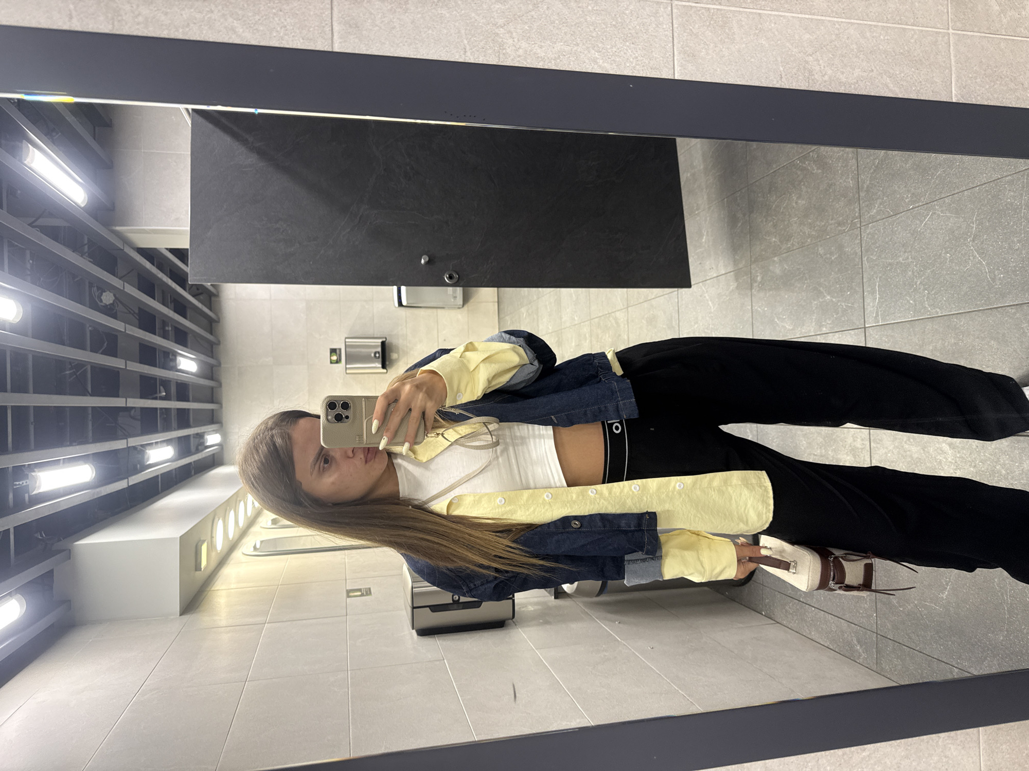 Mirror selfies in Sofia public restroom