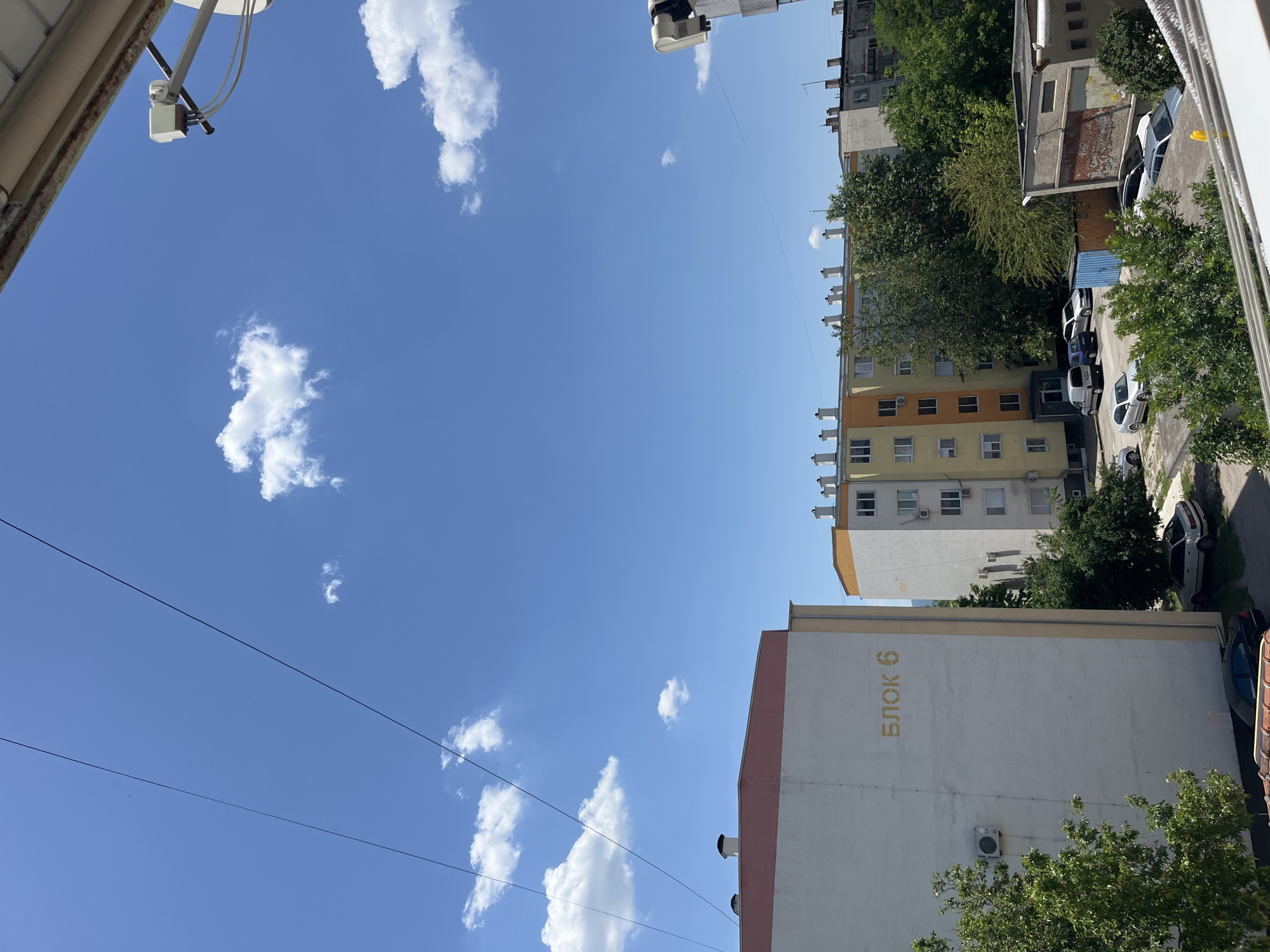 Mixed urban scenes: buildings, guitars, strawberries captured independently