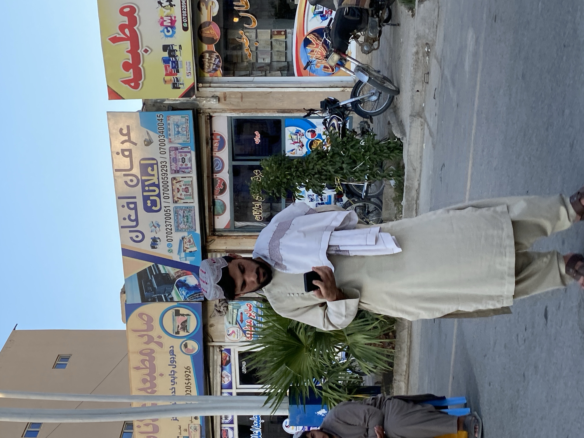 Street life in Kandahar captured across a busy late afternoon