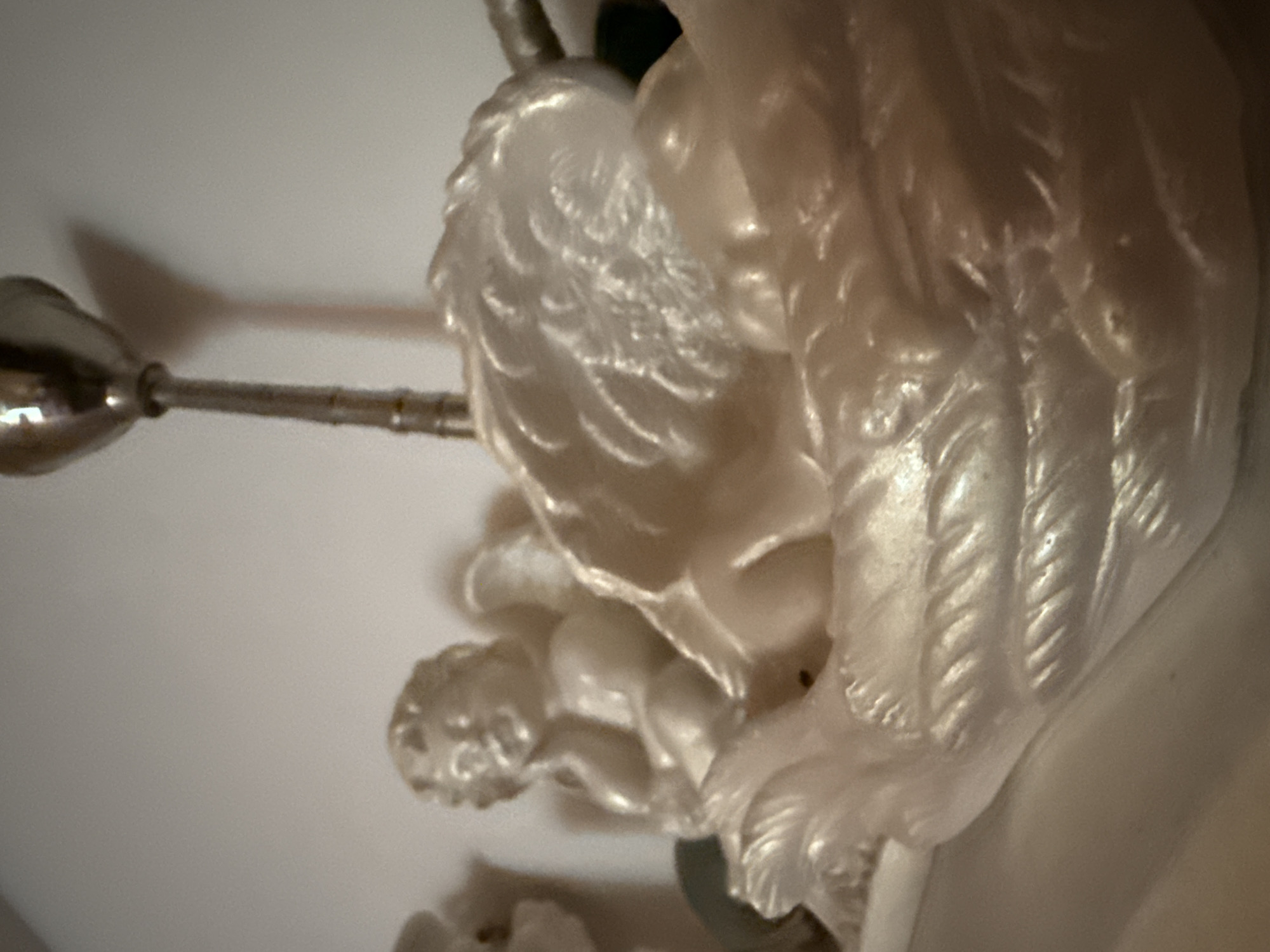 Home interior details: sleeping cats, figurines, and decorative objects