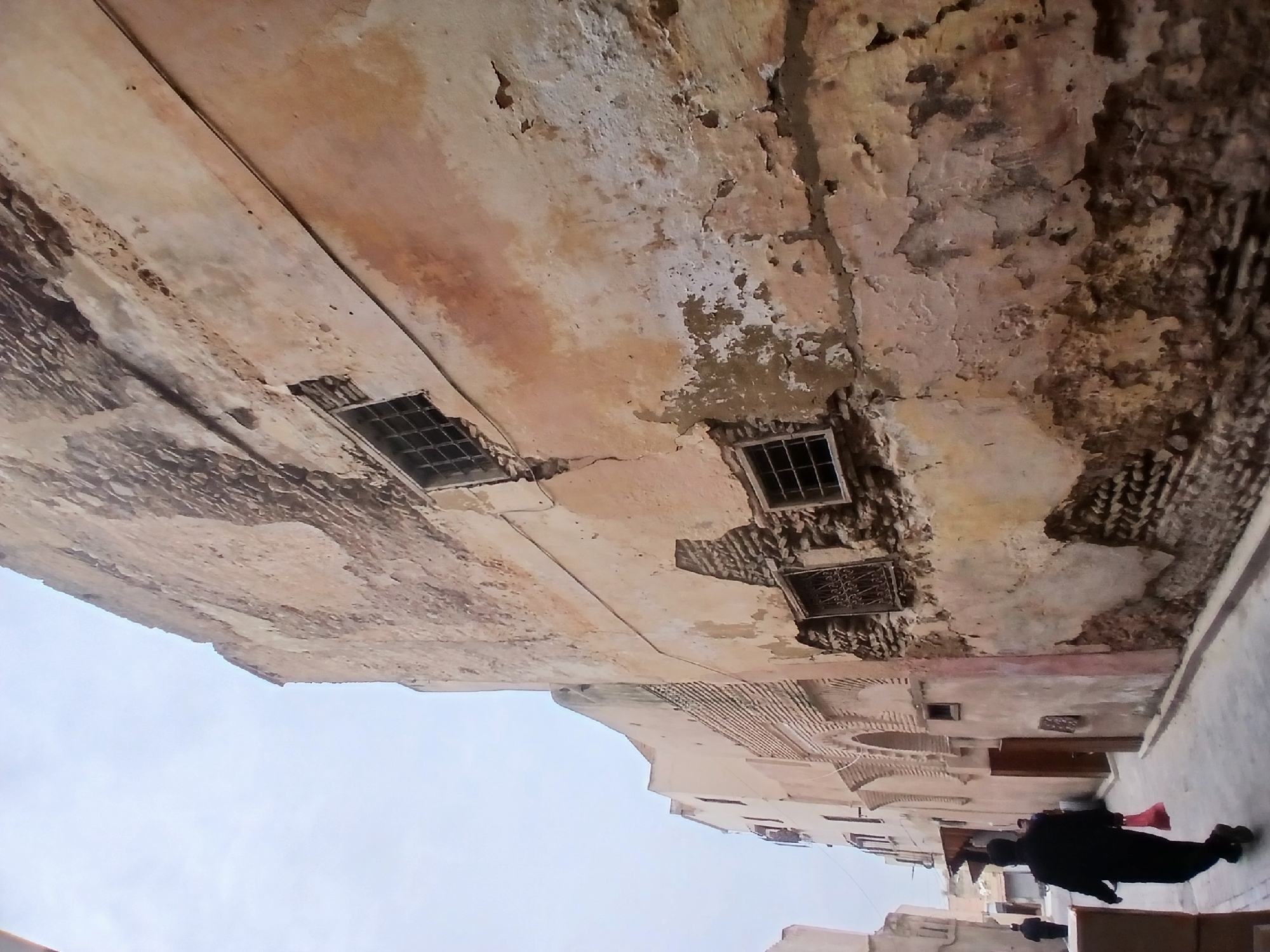 Weathered historic architecture documented in Meknes street scene